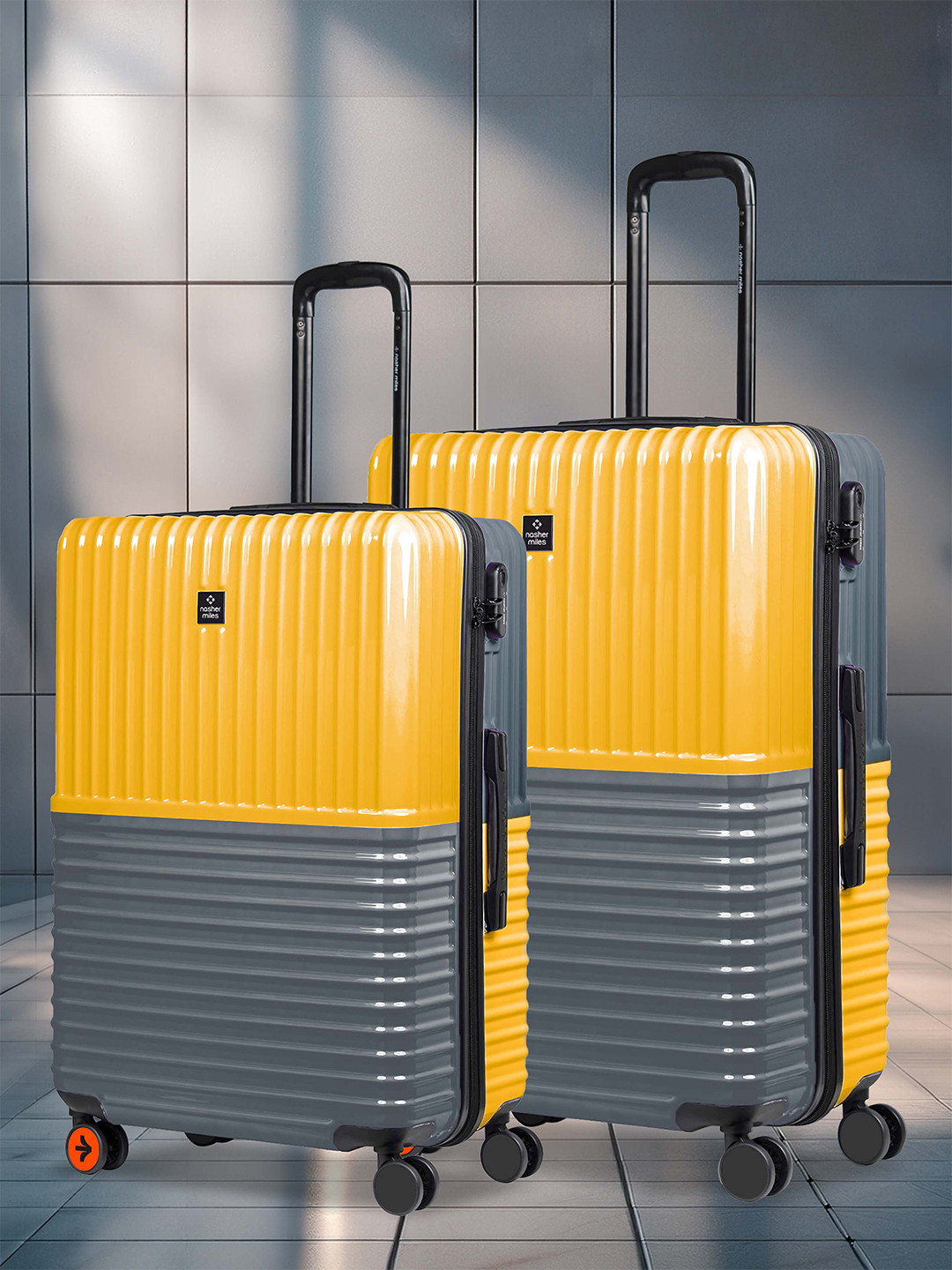 Nasher Miles Istanbul Hard-Sided ABS and PC Set of 2 M/L Yellow Grey Trolley Bags 65-75cm