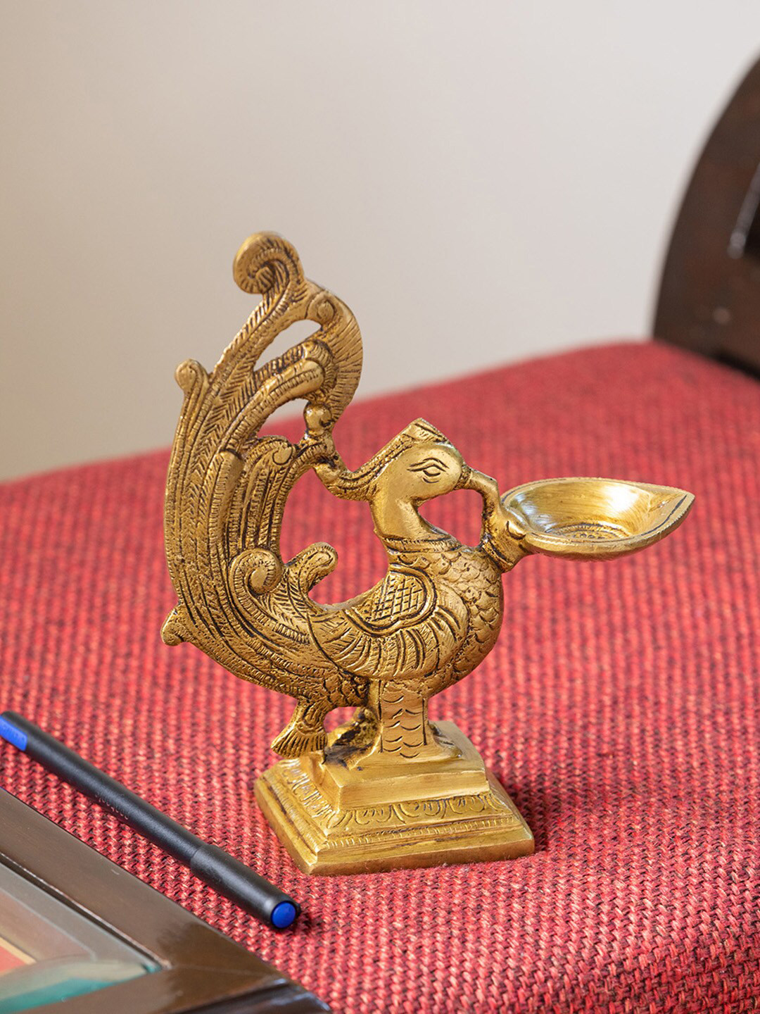 ExclusiveLane The Brass Beams Gold-Toned Textured Marvellous Peacock-Shaped Diya