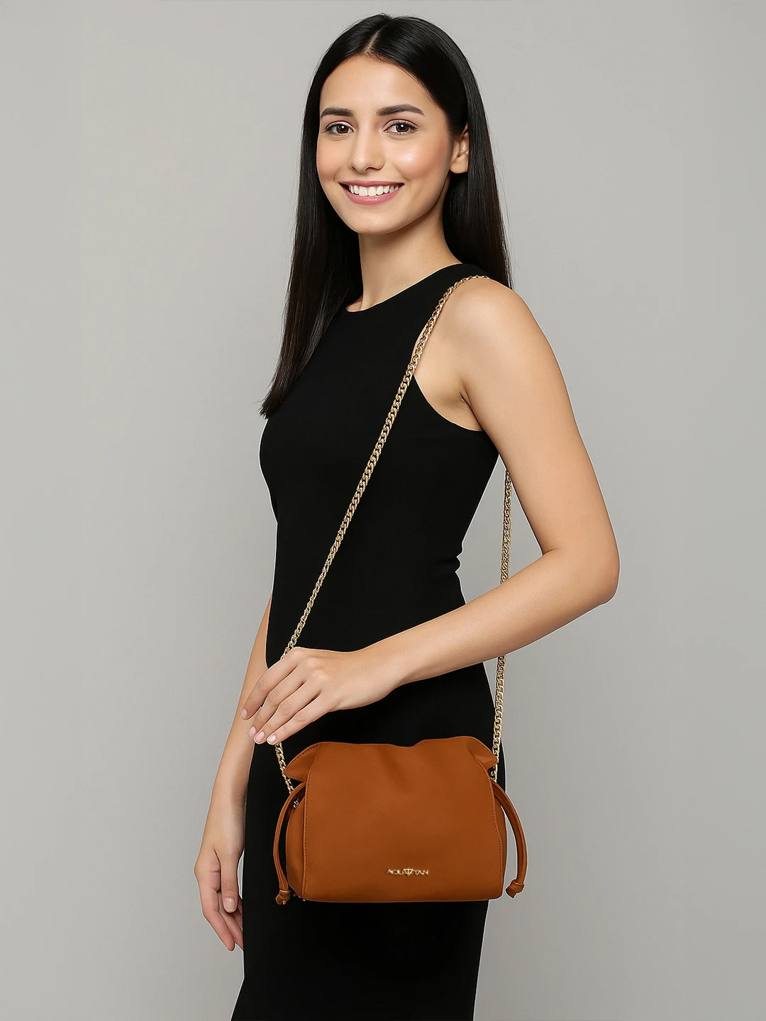 AQUATAN Structured Drawstring Sling Bag