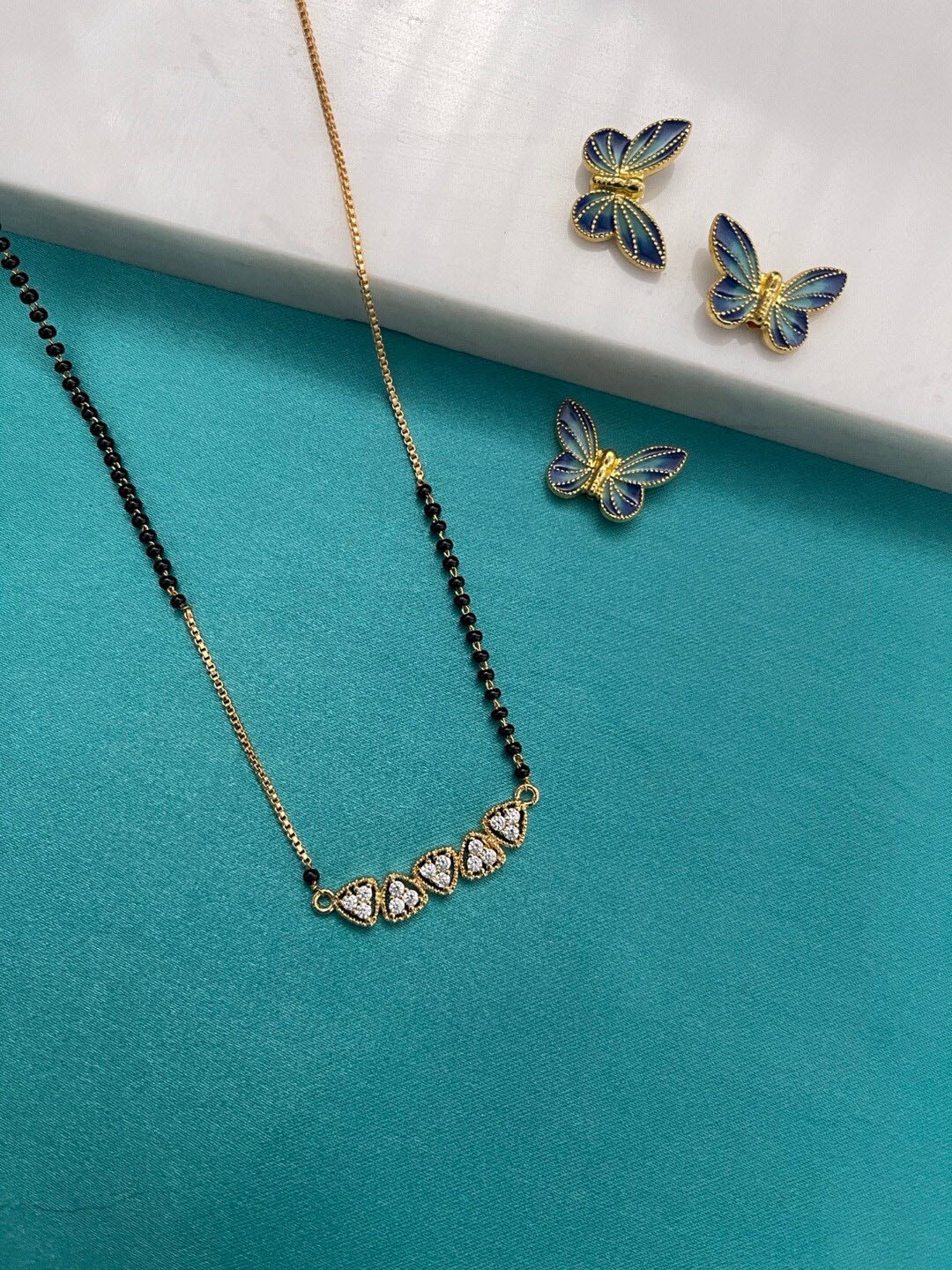 Digital Dress Room Gold-Plated AD-Studded & Beaded Mangalsutra with Earrings & Finger Ring