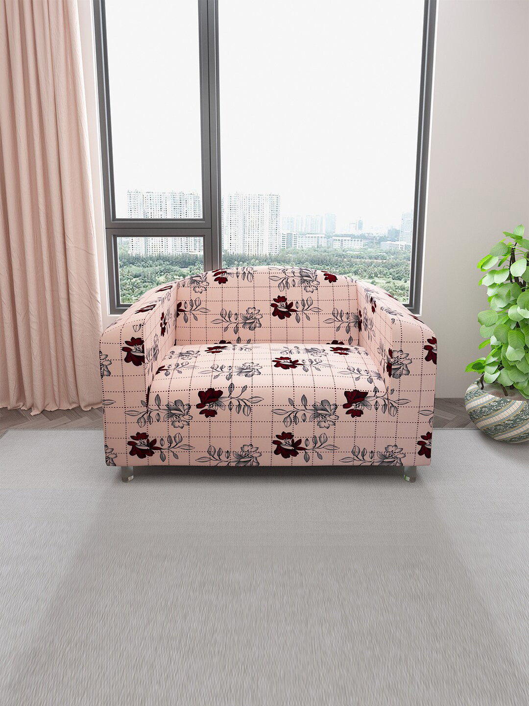 DREAM CARE Peach-Colored & Black Floral Stretchable 2-Seater Sofa Cover With Anti Slip Foam Sticks