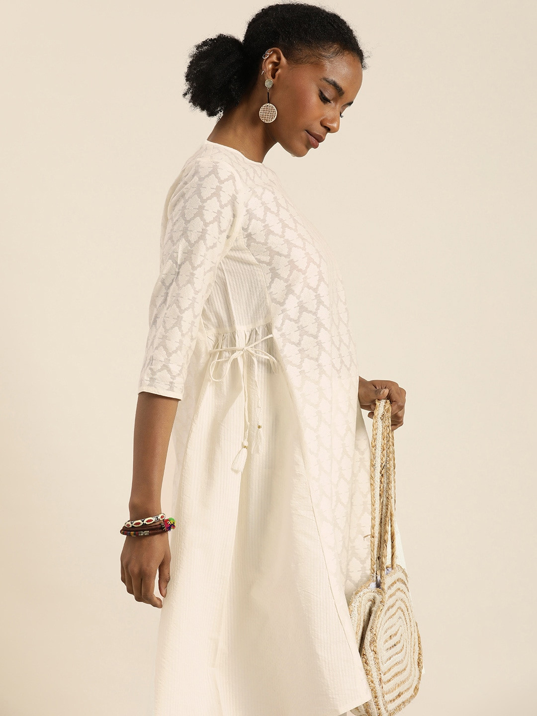 Taavi Cora Off White Woven Design A-Line Kurta With Tie-ups Detail