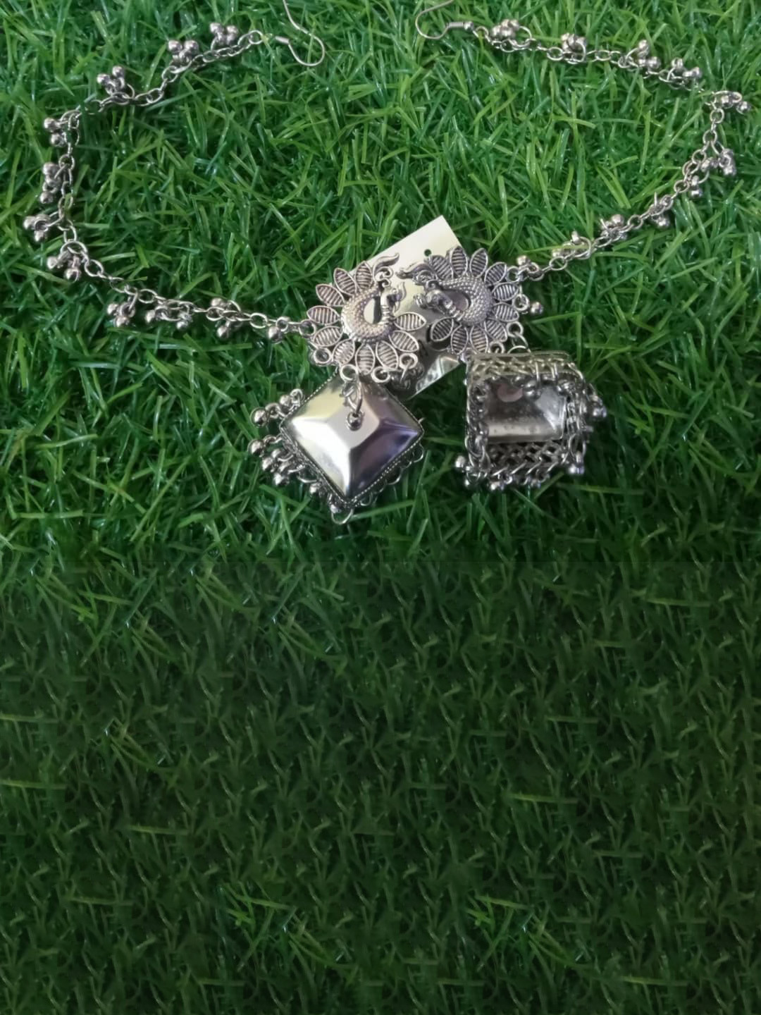 PRASUB Silver-Plated Peacock Shaped Jhumkas With Matil