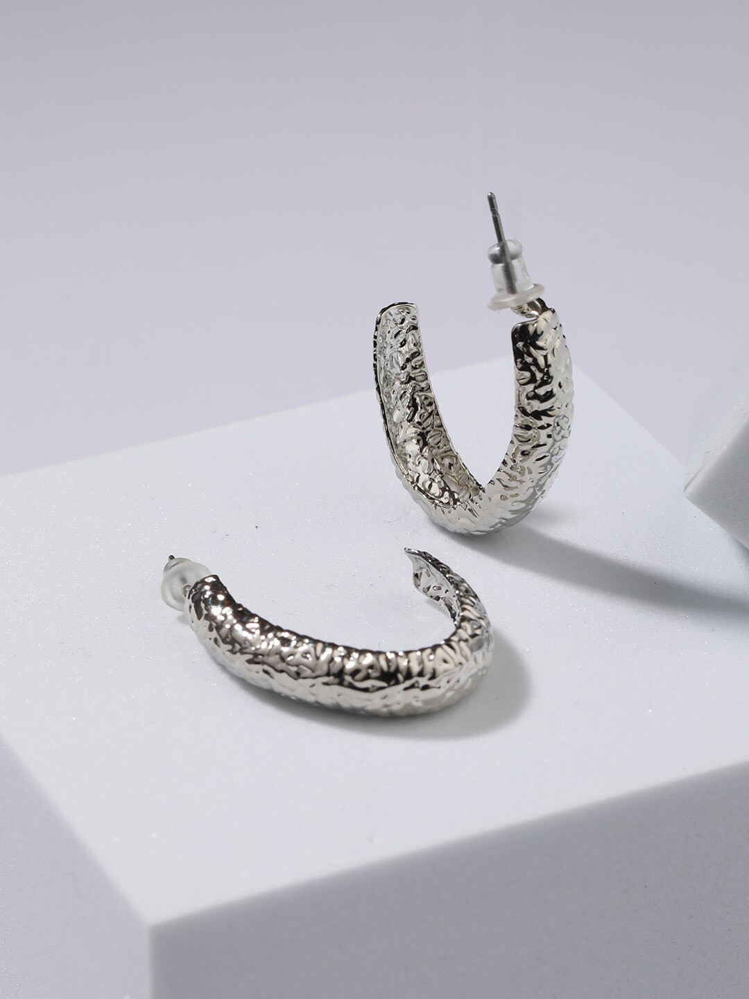 Jazz and Sizzle Silver Plated Textured Oval Hoop Earrings