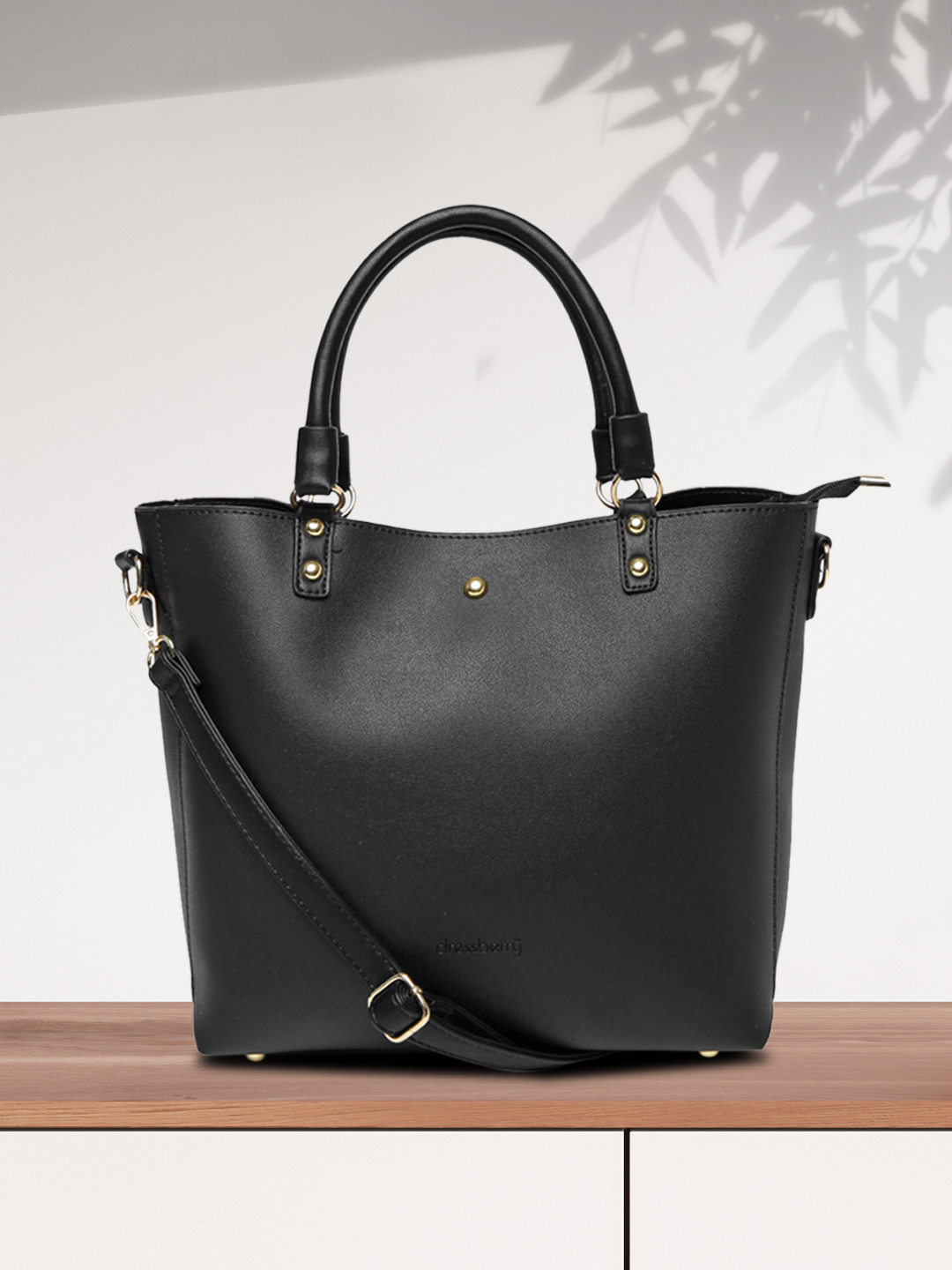 dressberry black solid handheld bag