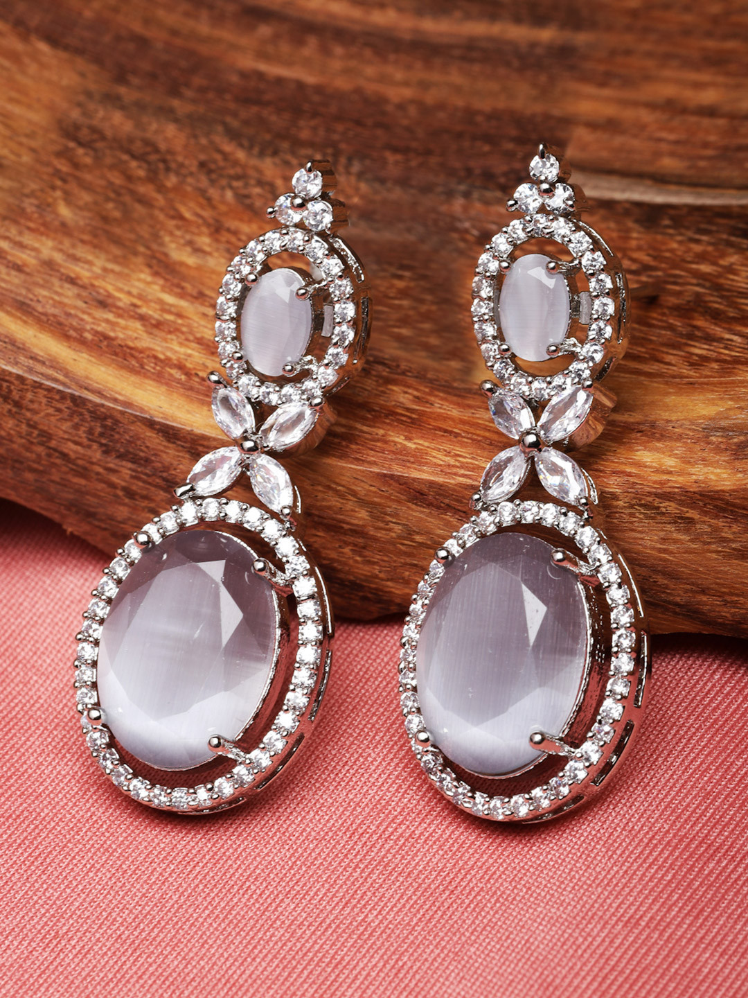 ZENEME Rhodium-Plated American Diamond Studded Oval Shaped Drop Earrings