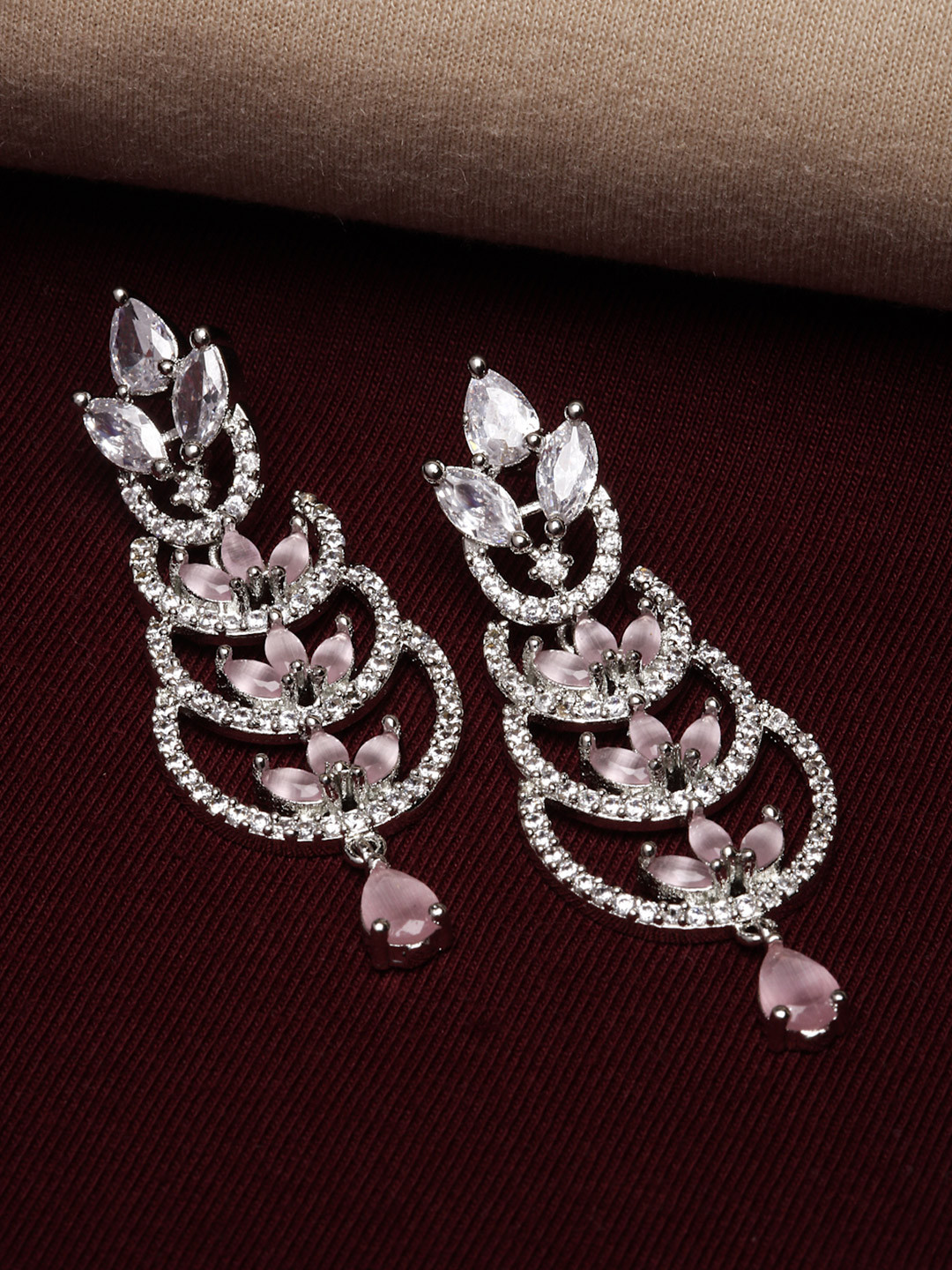 Zeneme Rhodium Plated Silver Toned Loop Design AD Studded Earrings