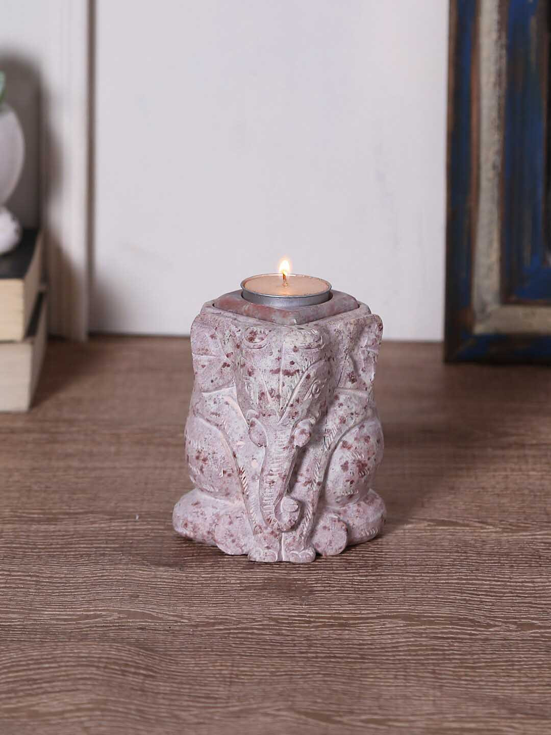 Aapno Rajasthan Beige Elephant Shaped Carved Stoneware Candle Stand