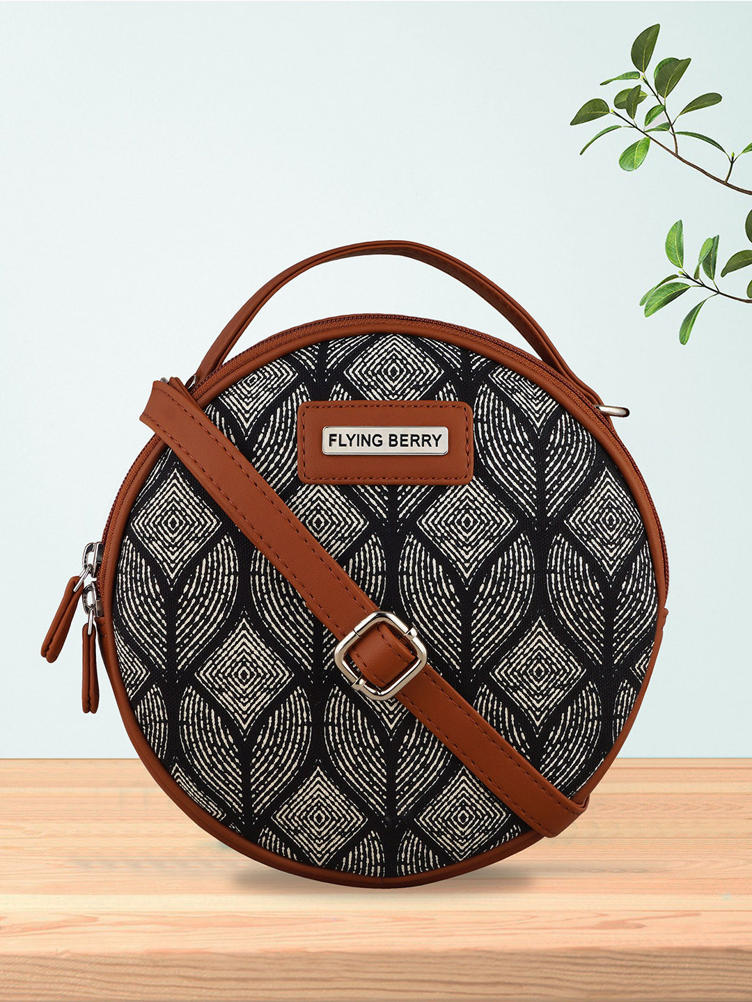 FLYING BERRY Black Printed Structured Sling Bag with Cut Work