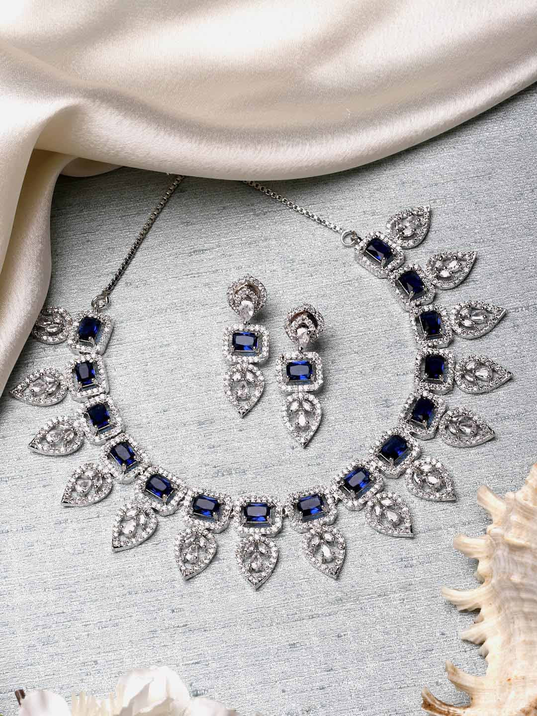 ZENEME Rhodium-Plated Blue American Diamond Studded Necklace And Earring Jewellery Set
