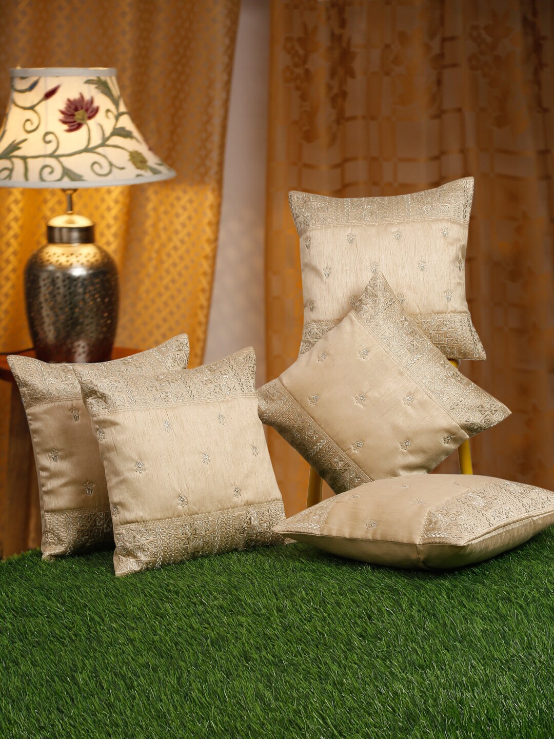 Gold coloured cushion outlet covers