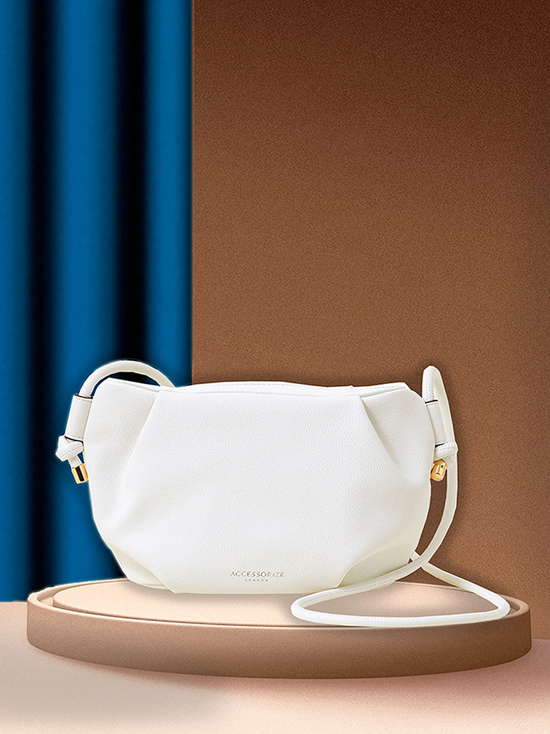 Accessorize London Women Faux Leather White Soft Cloud Knot Sling Bag