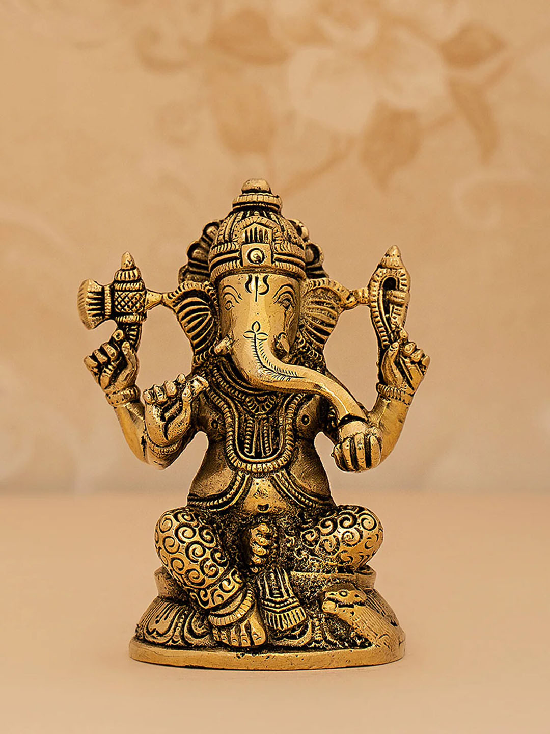 DecorTwist Sitting Ganesha Gold Brass Metallic Prayer Room Hand-Crafted Medium Showpiece - 2 Inches