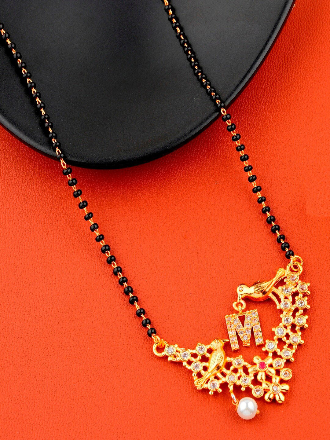 JEWEL WORLD Gold-Plated Stone-Studded & Alphabet M Charm Mangalsutra