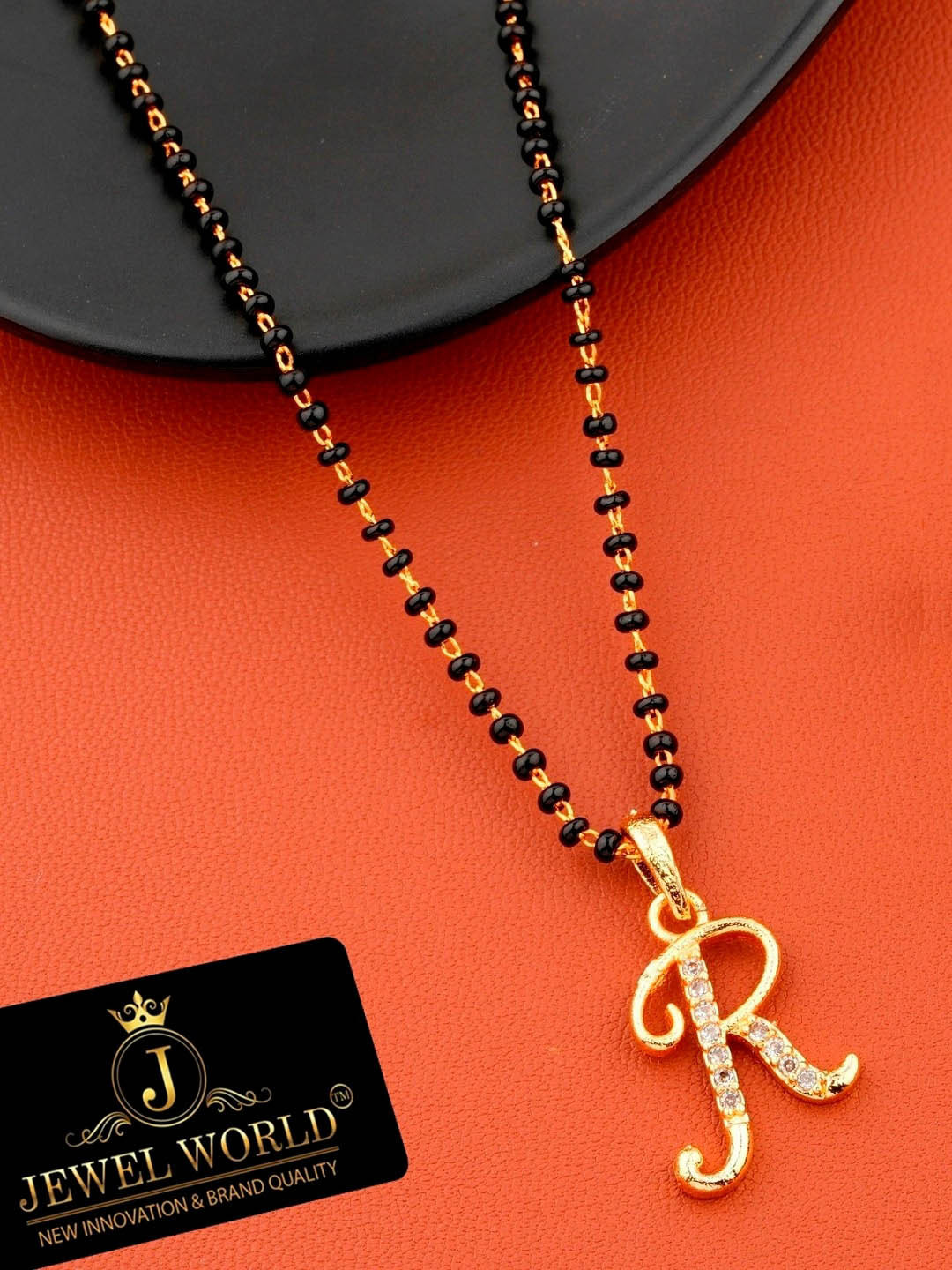 JEWEL WORLD Gold-Plated & Black Stone-Studded & Beaded Alphabet R Charm Mangalsutra