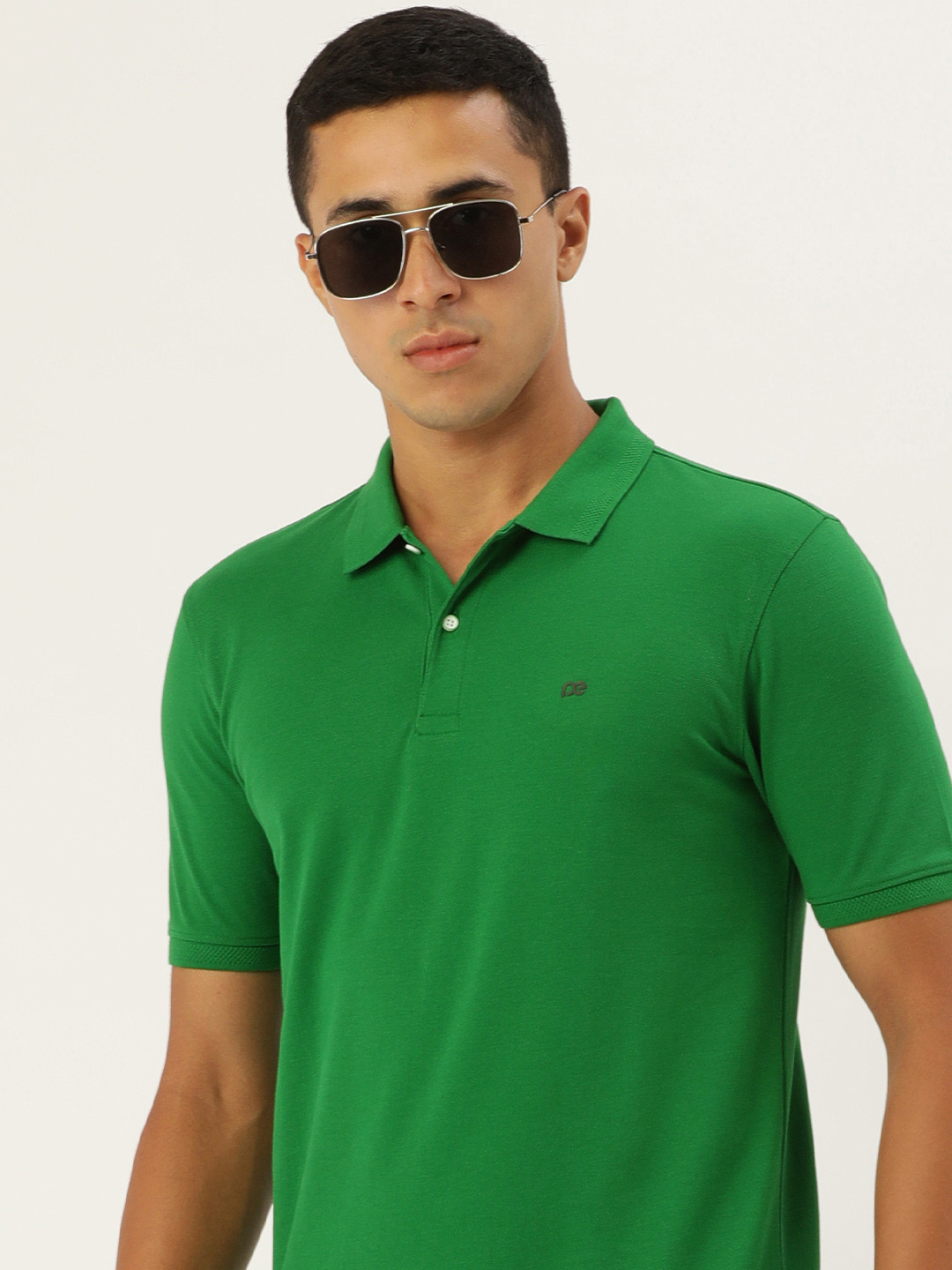 Peter England Solid Polo Collar Knitted T-shirt