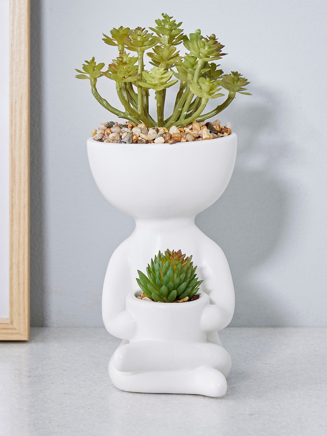 Home Centre Gloria White Artificial Plant In Ceramic Human Planter