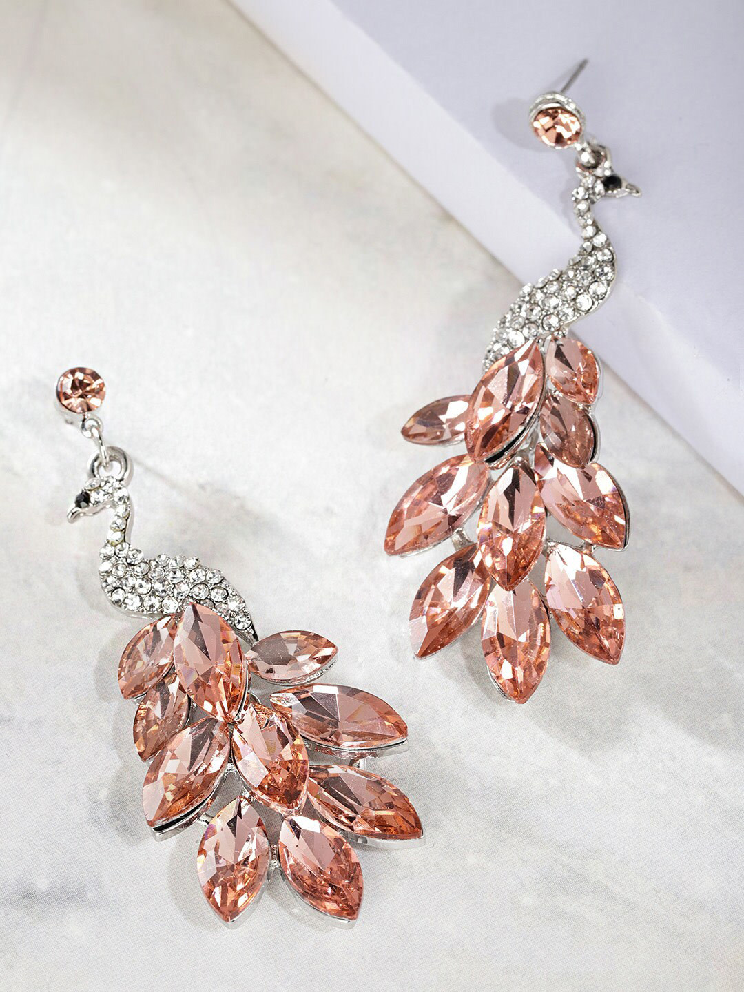 DressBerry Silver-Plated And Peach-Coloured Artificial Stones Peacock Shaped Drop Earrings