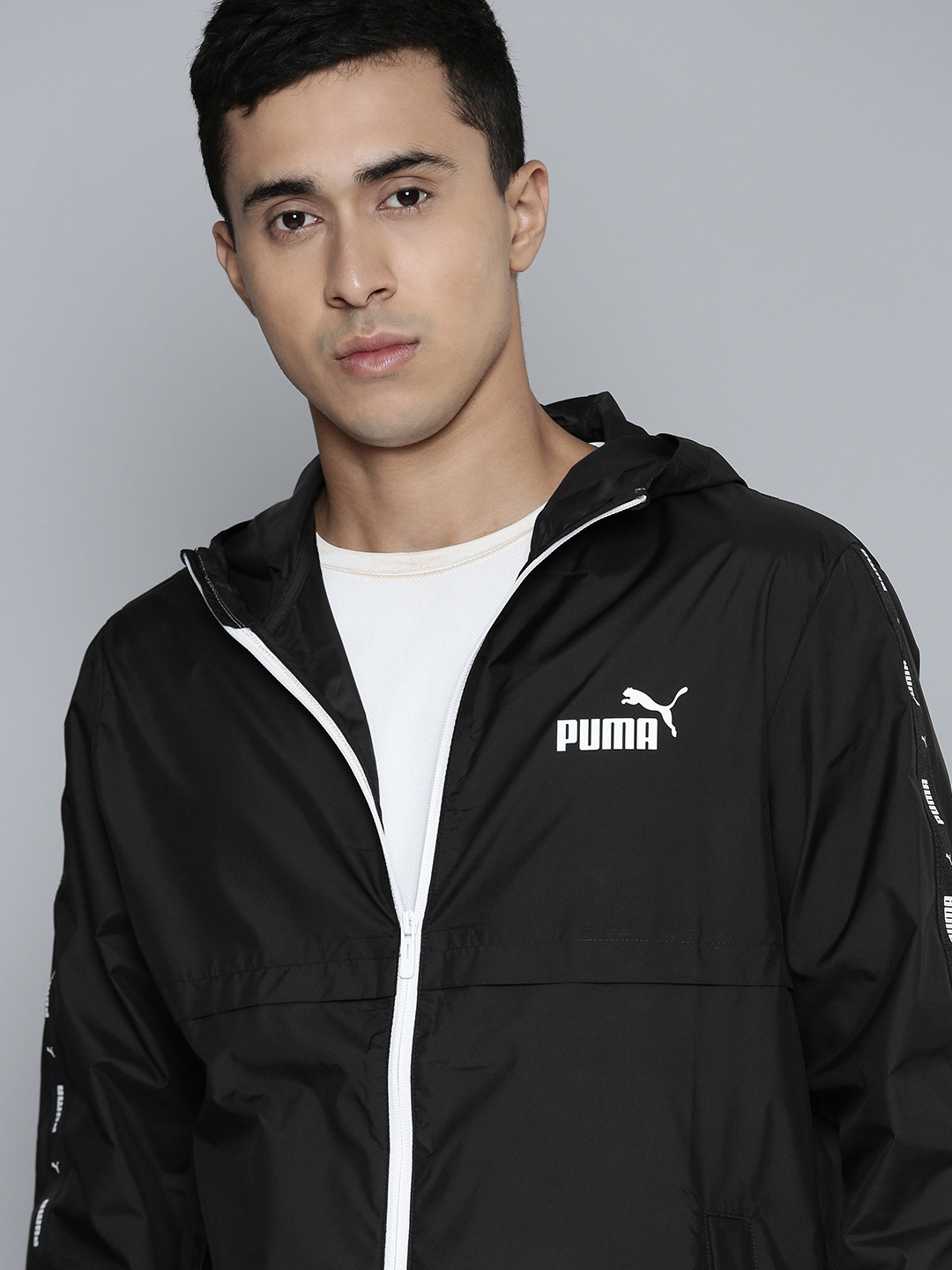 Buy Puma Essential+TAPE Windbreaker rainCELL Outdoor Sporty Jacket - Jackets  for Men 23087582 | Myntra