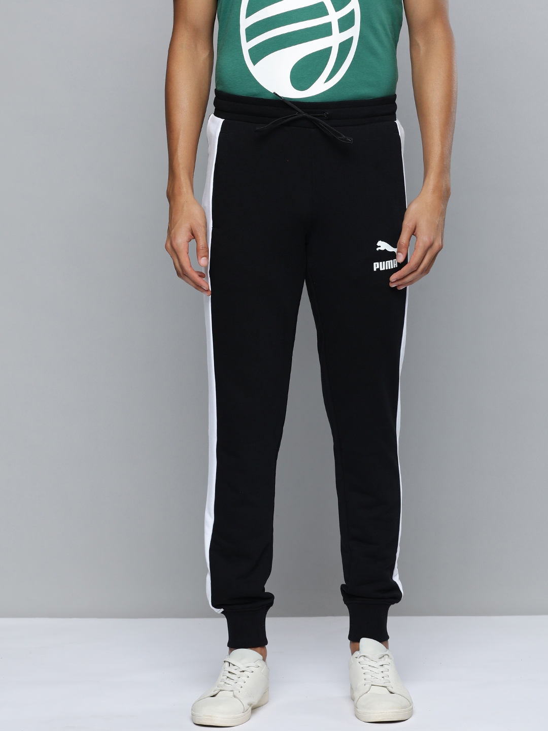 Buy Puma Men Brand Logo Printed Iconic T7 Joggers With Side Stripes Track Pants for Men 23087600 Myntra