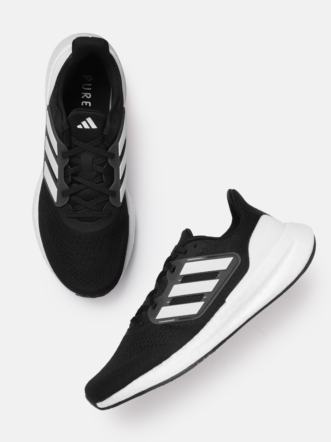 Pure black sports shoes discount