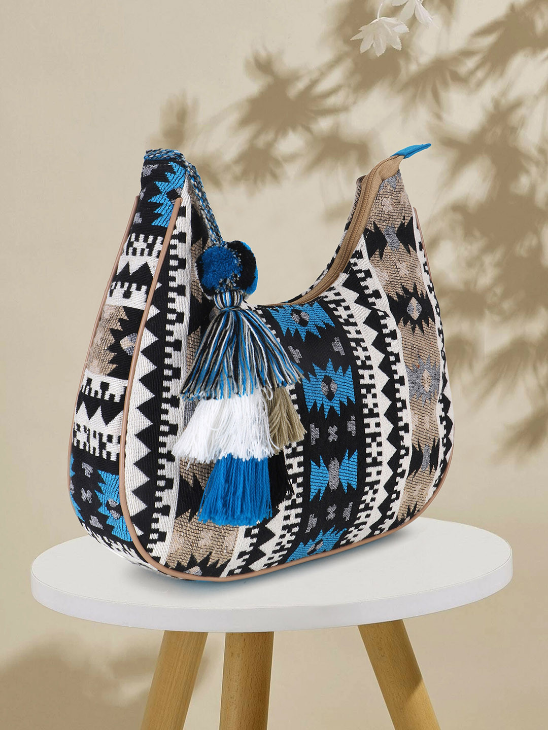 Anekaant Geometric Jacquard Tasselled Sling Bag