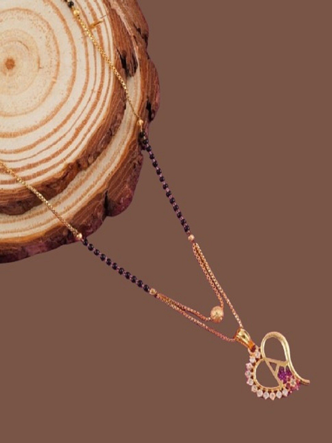 JEWEL WORLD Gold-Plated Stone Studded & Beaded Alphabet A Letter Mangalsutra