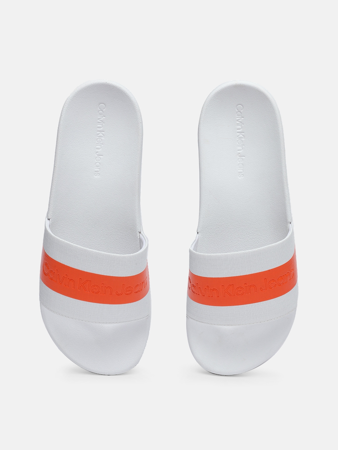 White calvin klein store flip flops