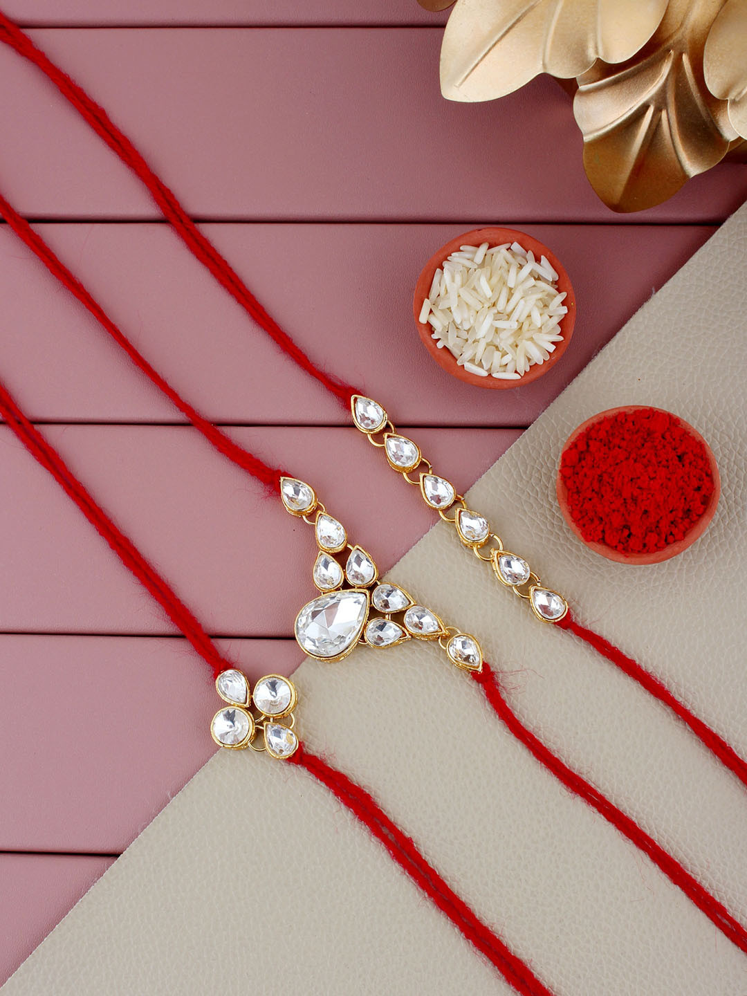 LUCKY JEWELLERY Gold-Plated Cubic Zirconia Studded Love Rakhi with Card & Roli Chawal