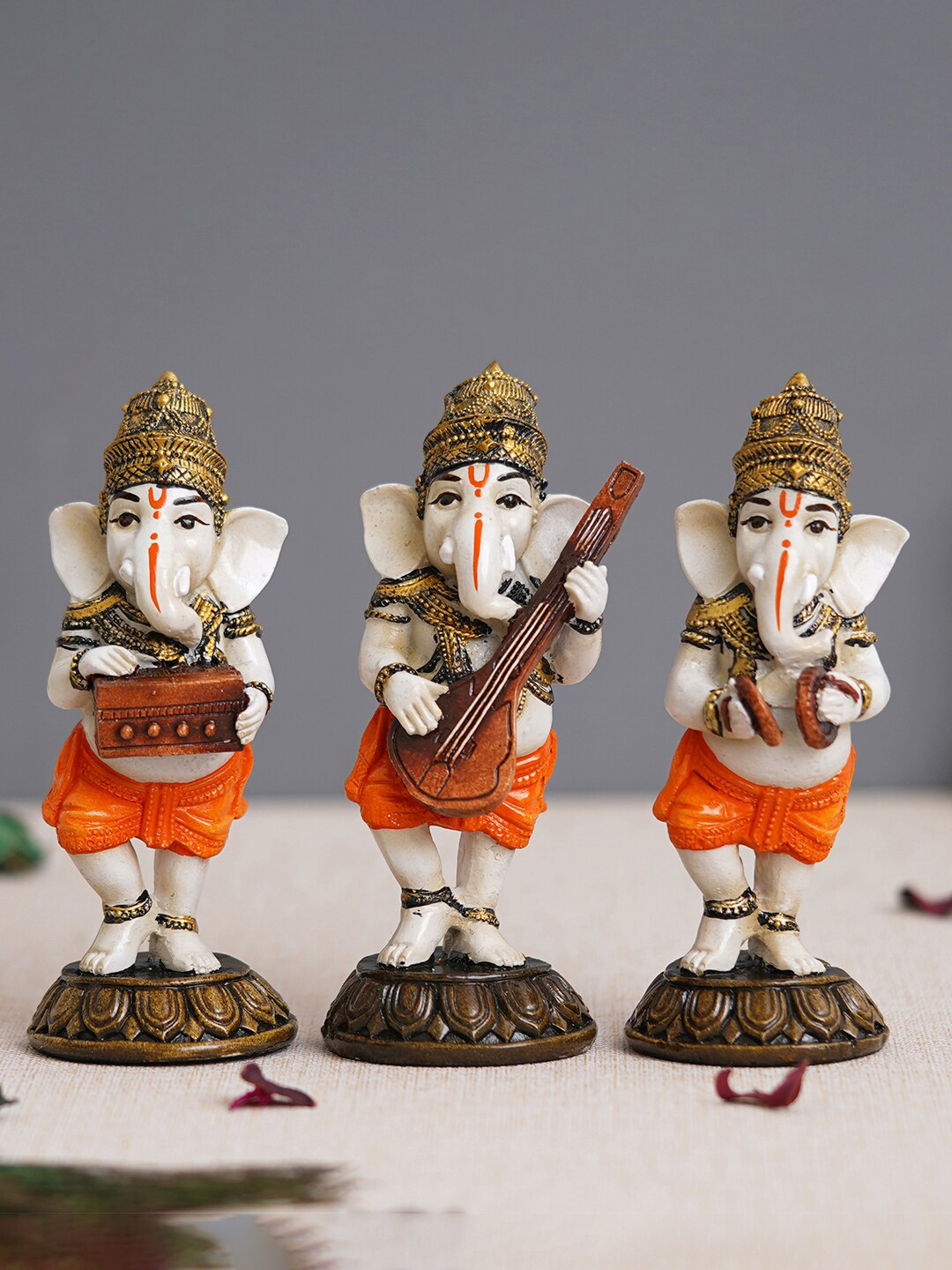eCraftIndia Standing Lord Ganesha Playing Harmonium Orange Polyresin Glossy Prayer Room Set of 3 Large Showpieces - 2.4 Inches