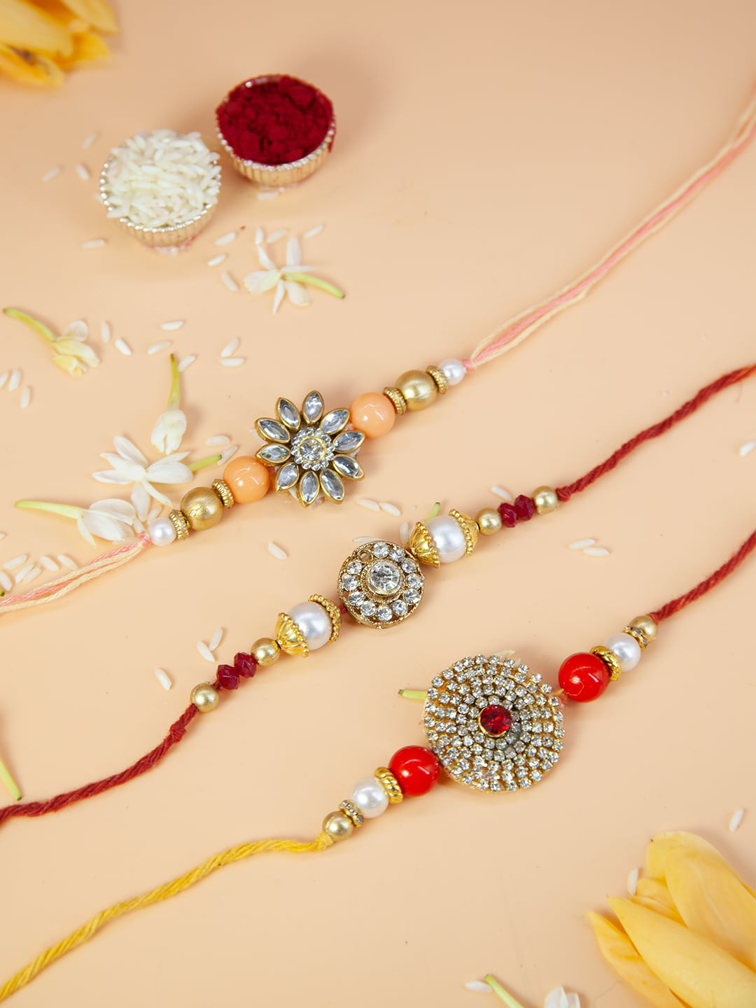 Fida Set of 3 Floral Beaded Pearl with Kundan Studded Rakhis With Roli Chawal