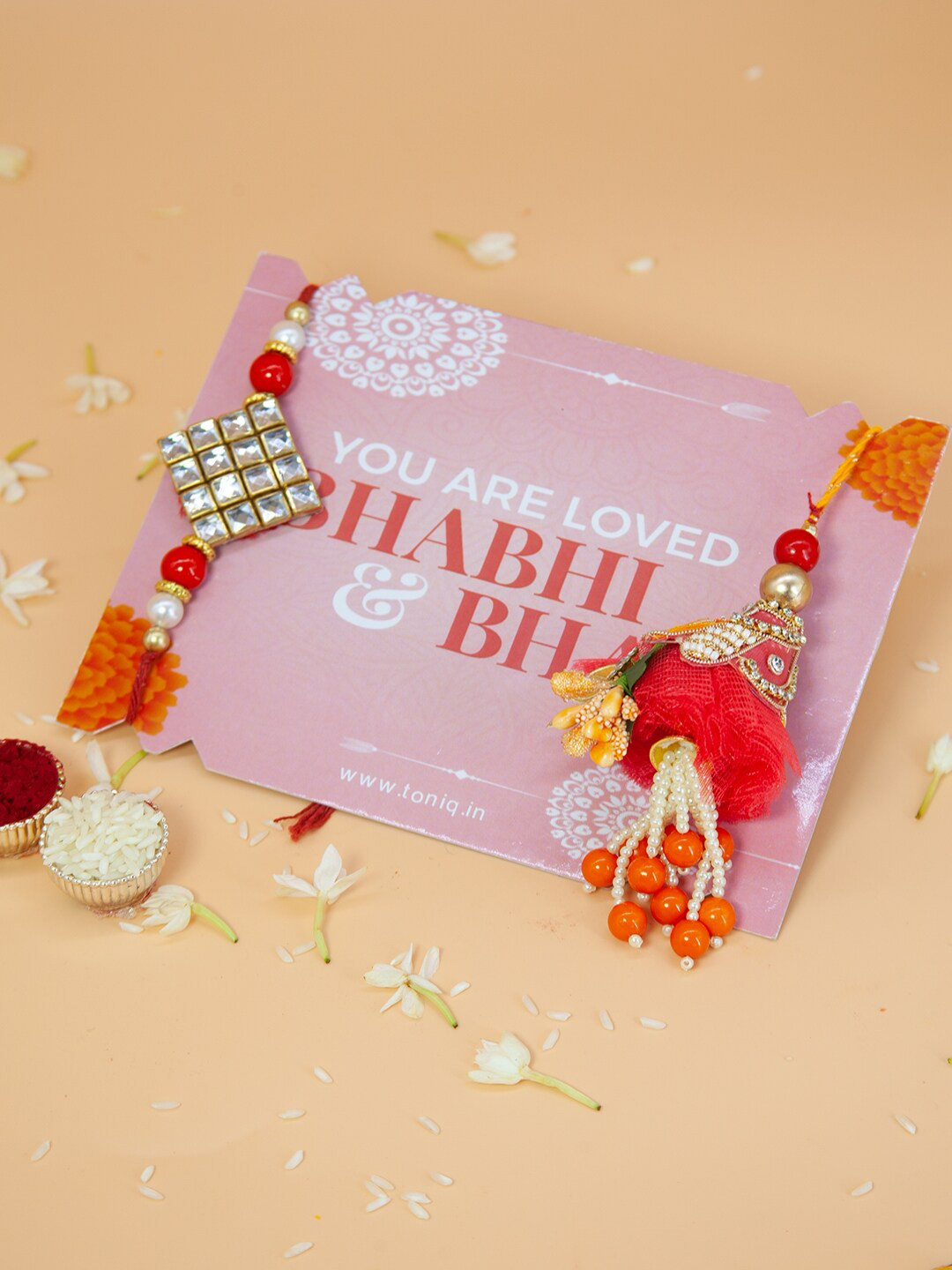 Fida Set of 2 Floral Pearl And Kundan Studded Rakhi