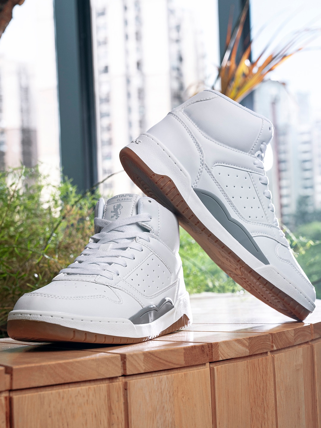 Red tape mid top sneakers top