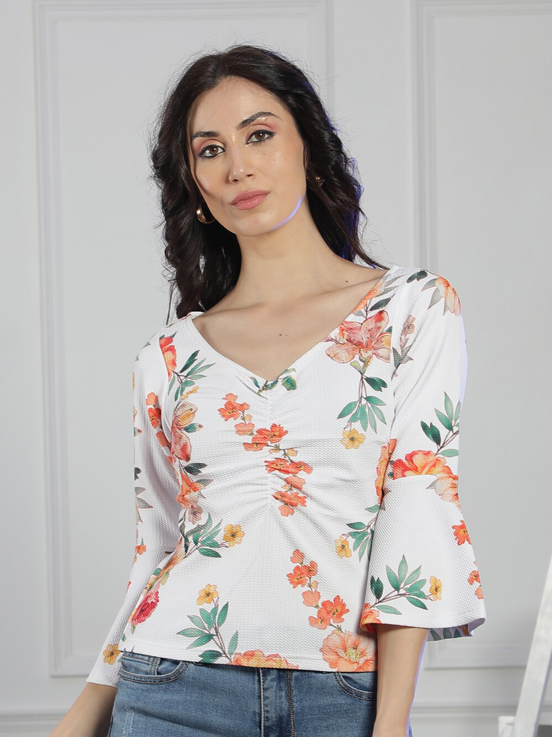 NEUDIS Floral Printed Bell Sleeve Ruched Top