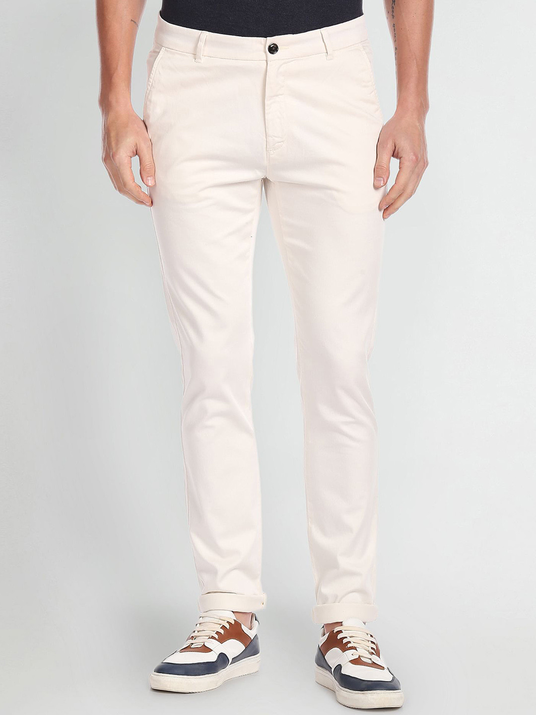 Buy Arrow Sport Men Skinny Fit Low Rise Solid Autoflex Trousers