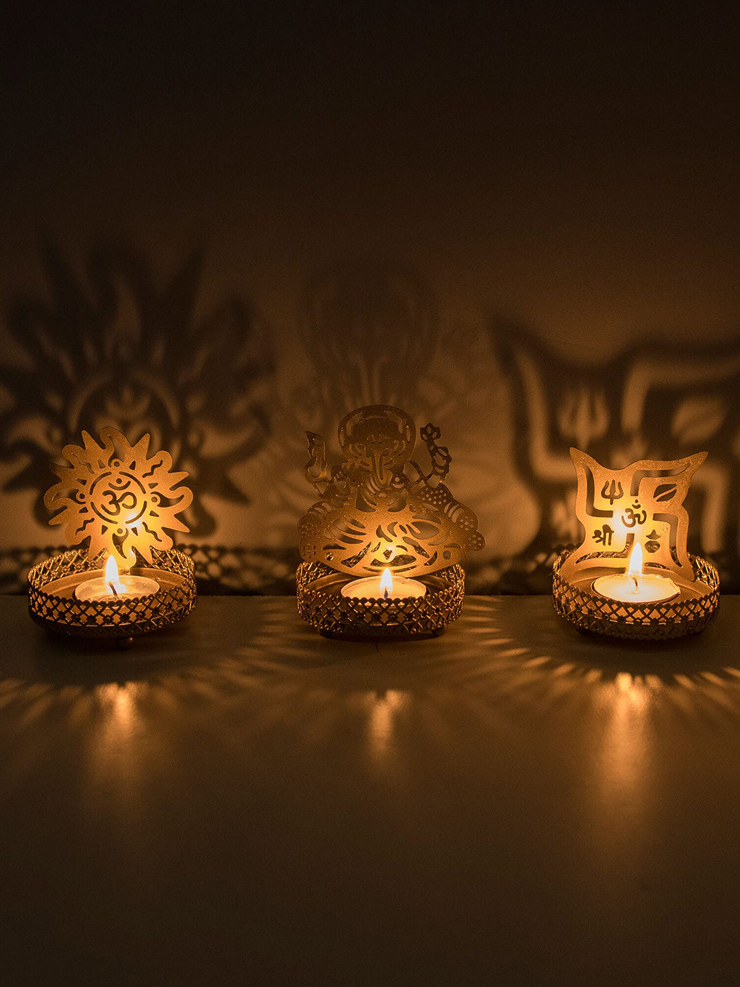 Homesake Gold Toned 3 Pieces Shadow Ganesh Sathiya Om Metal Candle Holders