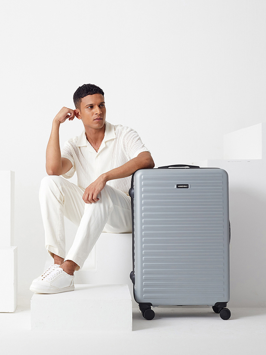 Assembly Silver Hard-sided Large Check-in Trolley Luggage- 85Liters