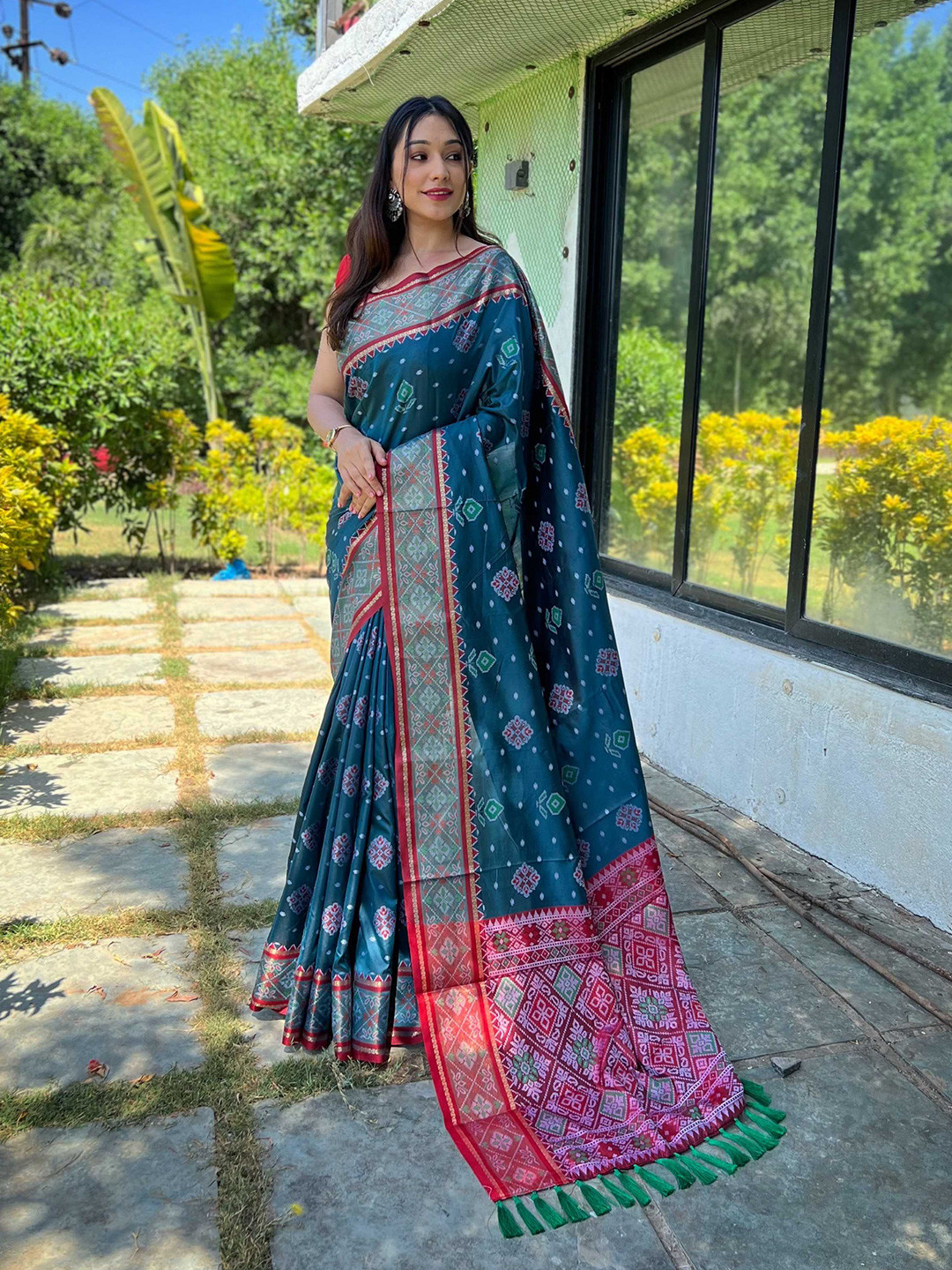 Mitera Teal & Red Ethnic Motifs Woven Design Zari Patola Saree