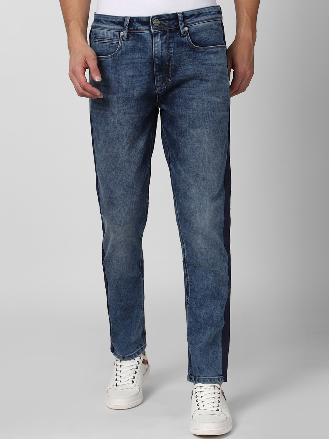 Peter England Casuals Men Slim Fit Clean Look Heavy Fade Whiskers Jeans