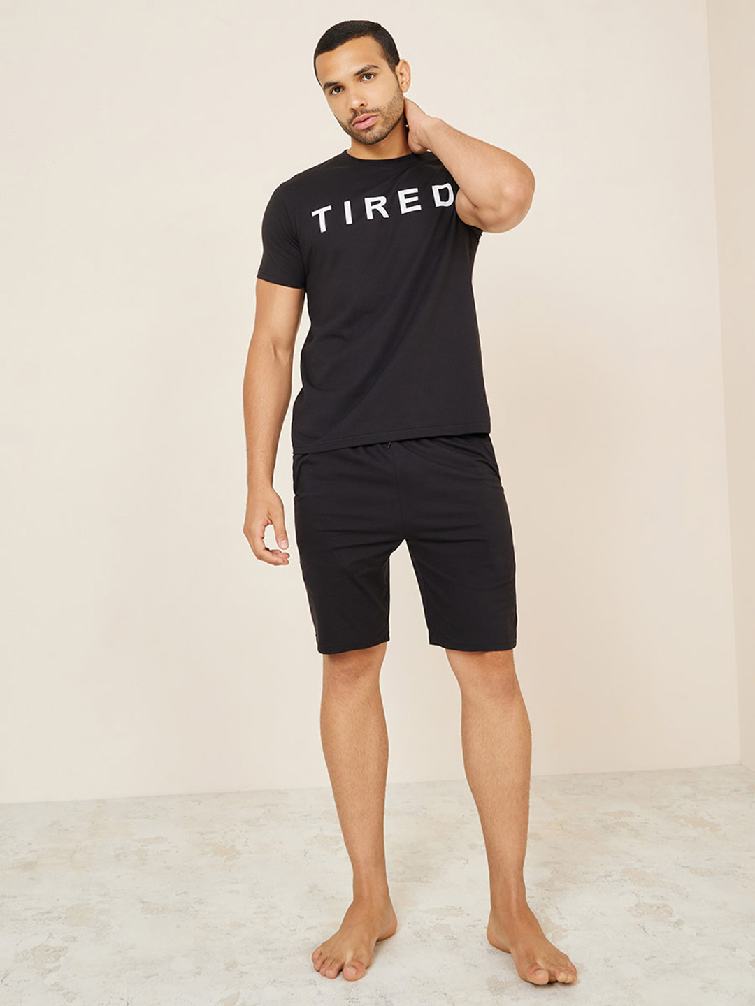 Styli Men Slogan Print T-Shirt & Solid Shorts Set