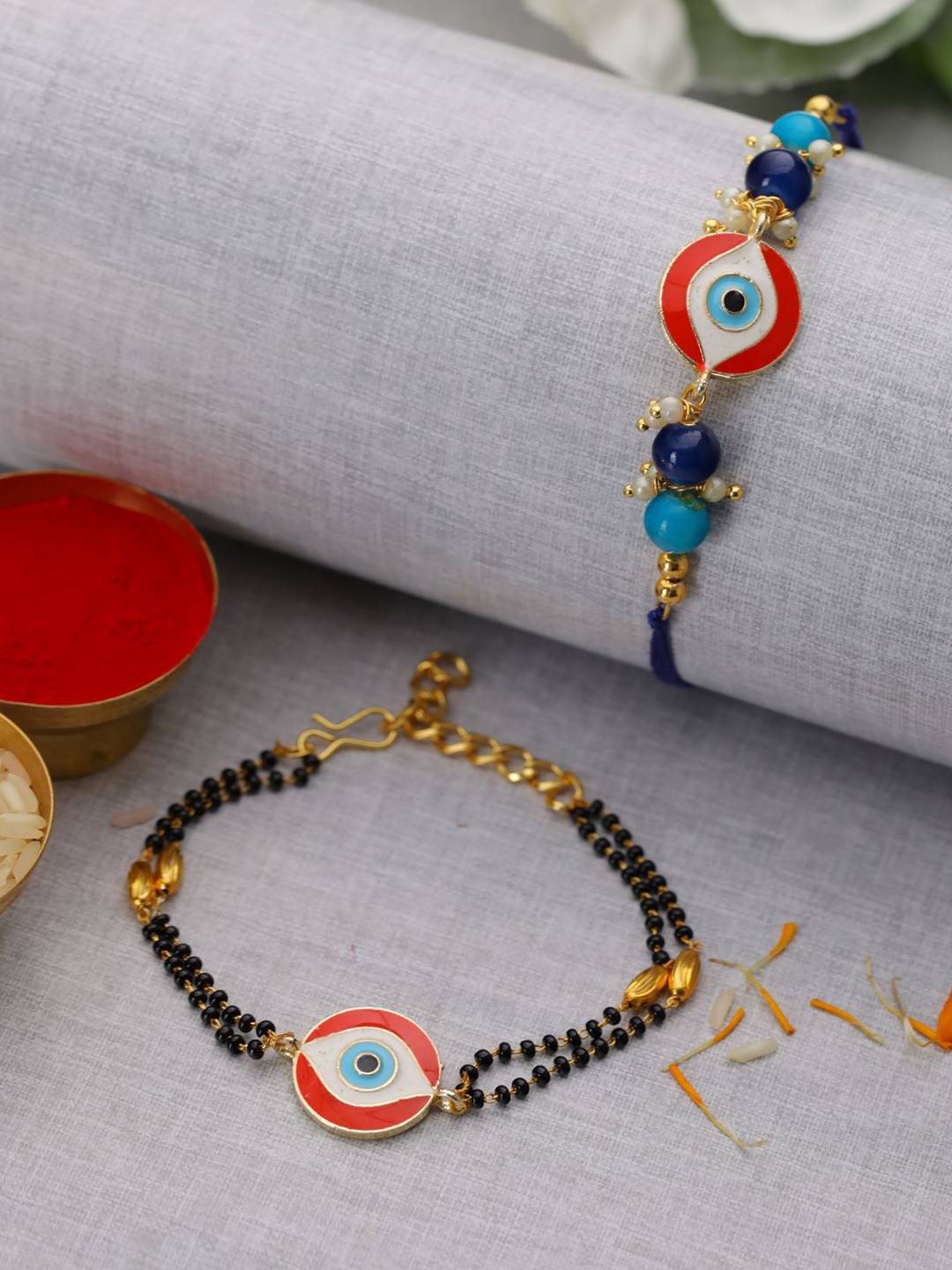 Jazz and Sizzle Set Of 2 Rakhi with Roli & Chawal