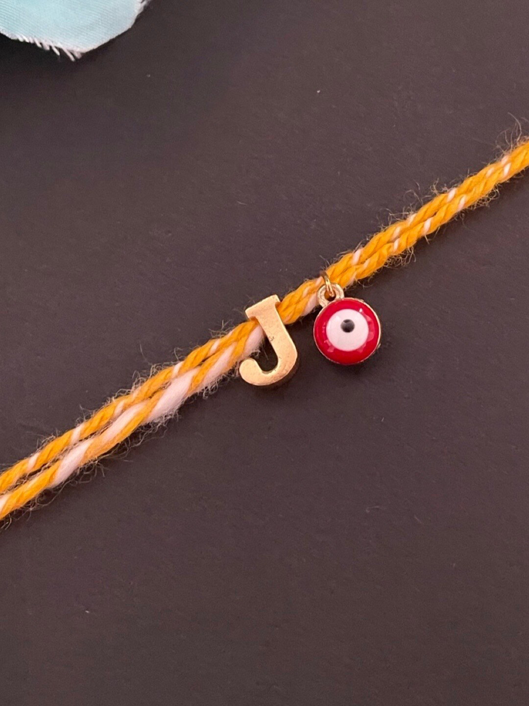 Digital Dress Room Gold Plated Letter J Alphabet & Evil Eye Charm Rakhi
