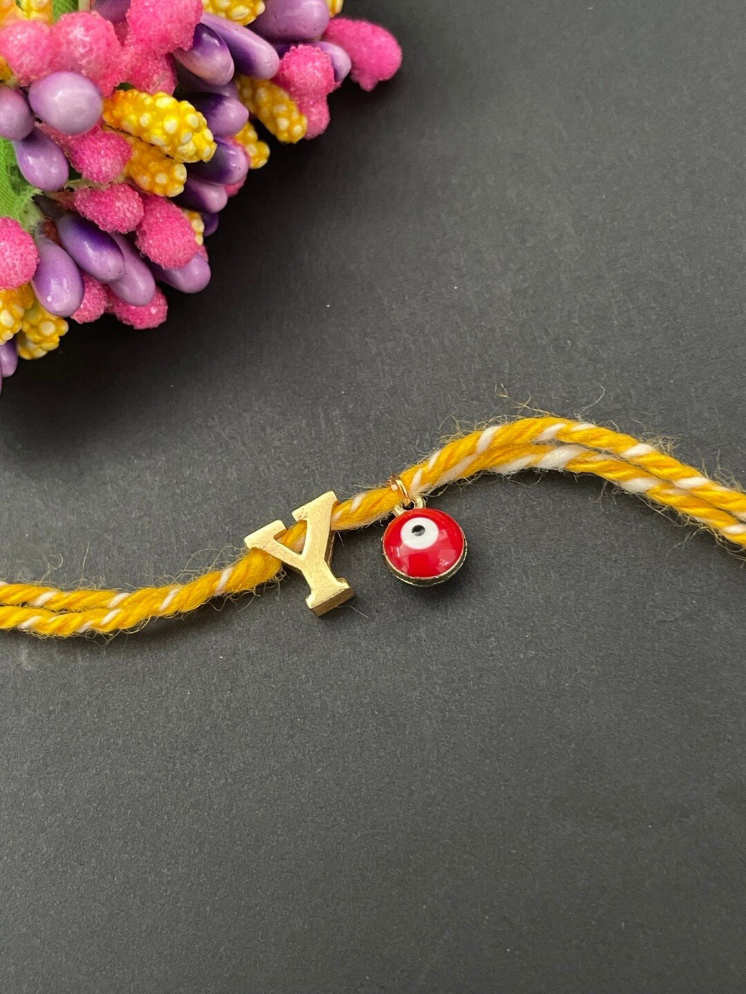 Digital Dress Room Gold-Plated Y Alphabet & Evil Eye Charm Rakhi