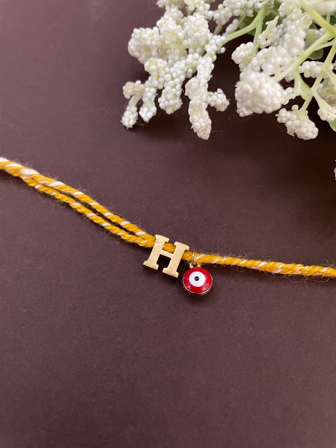 Digital Dress Room Gold Plated & H Letter With Evil Eye Charm Bracelet Rakhi