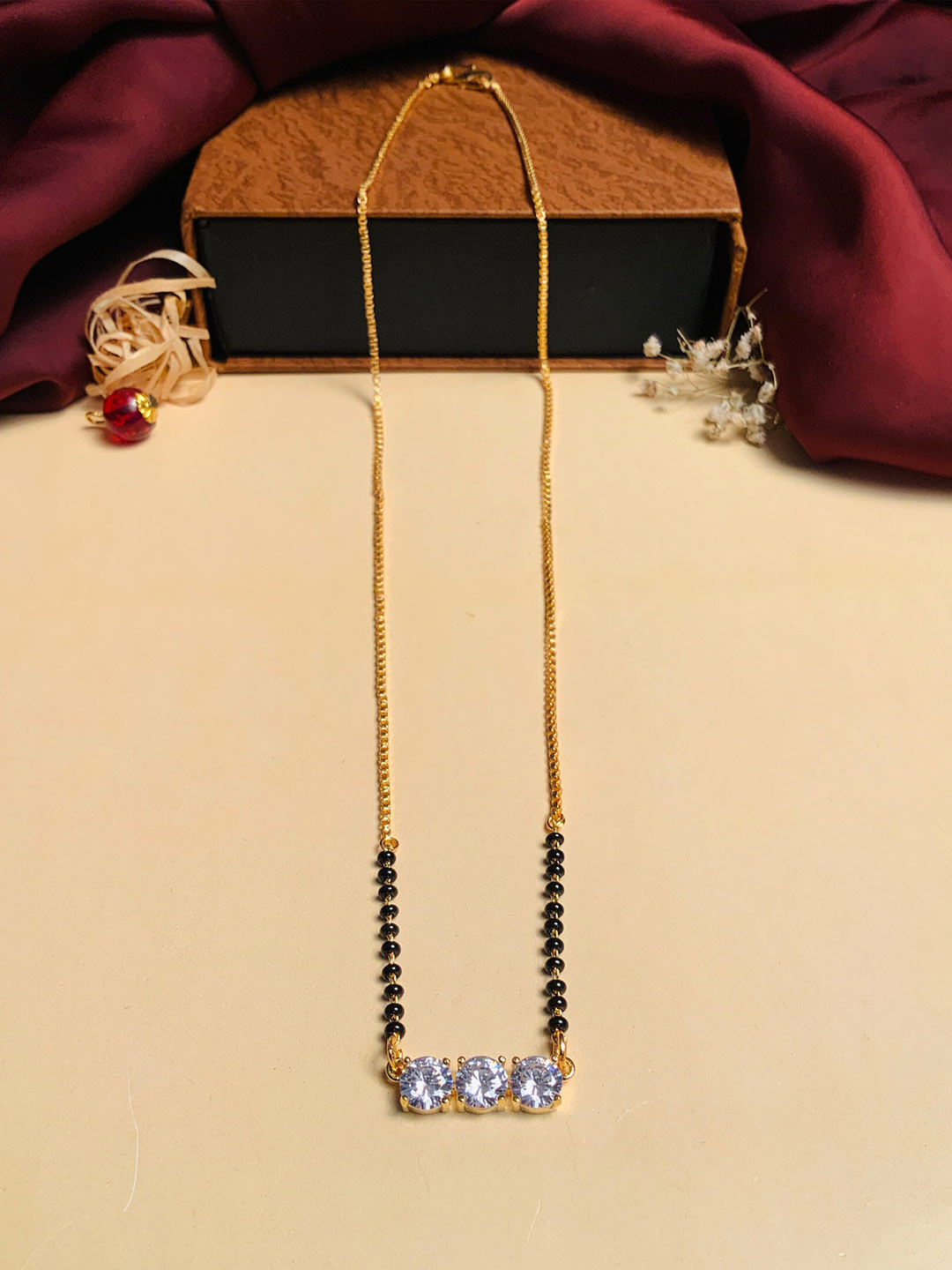 ABDESIGNS Gold-Plated White American Diamond & Black Beaded Mangalsutra