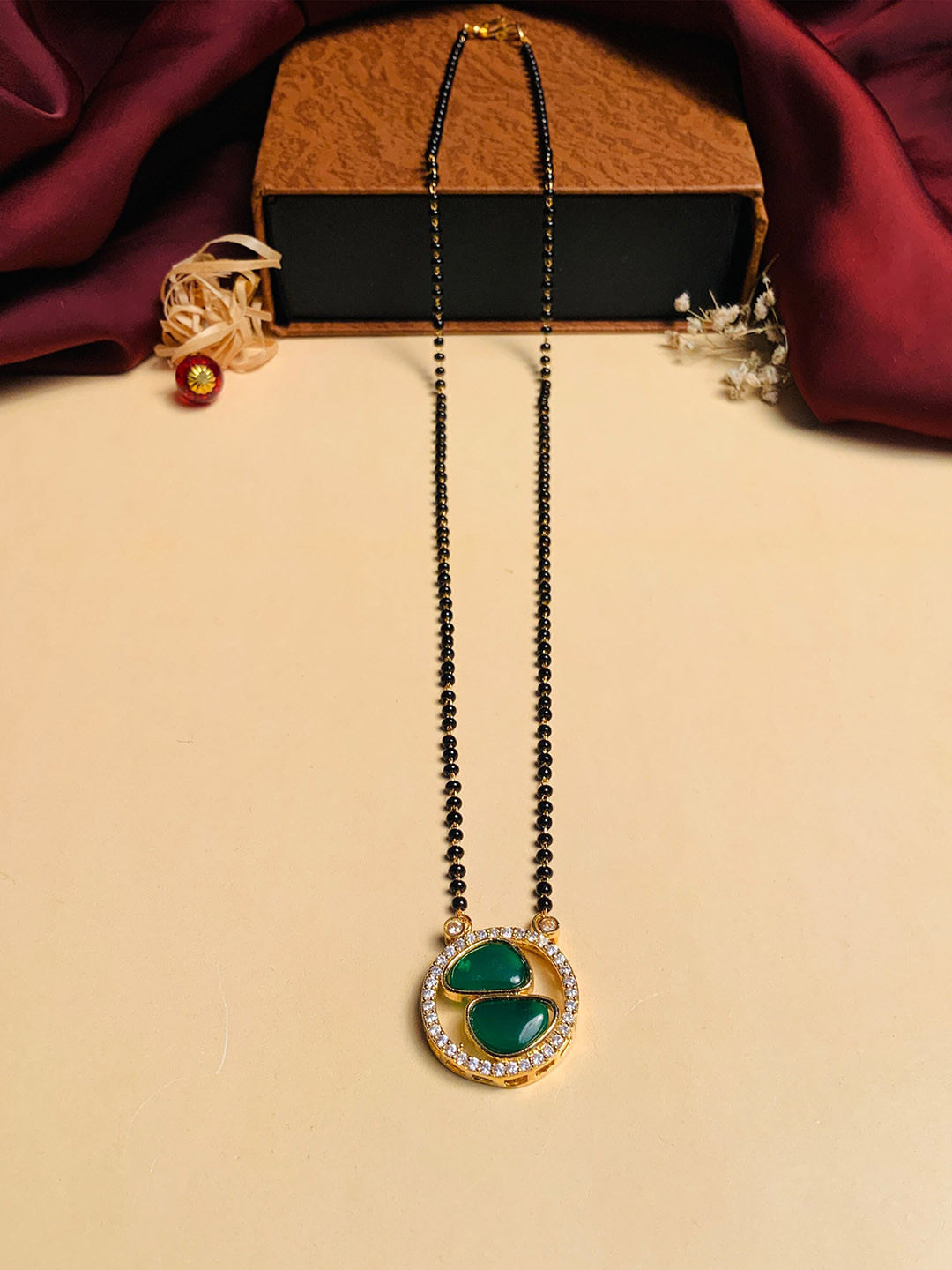ABDESIGNS Gold-Plated Black Beaded Mother Pearl & American Diamond Mangalsutra