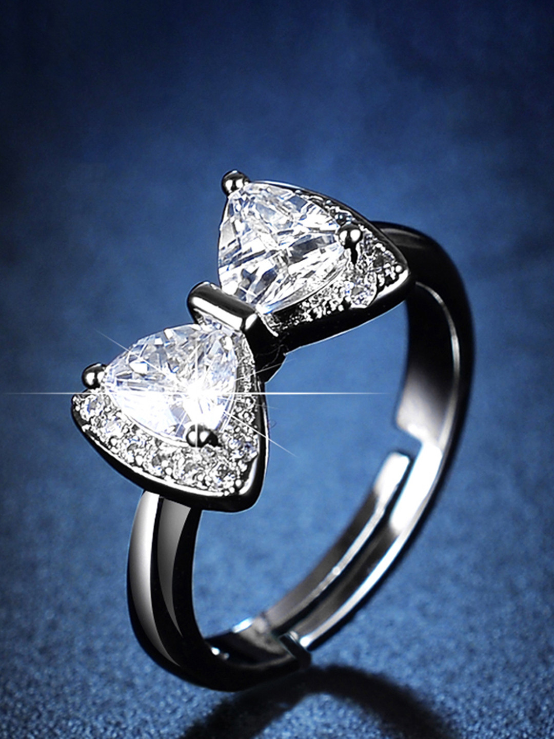 Jewels Galaxy Silver-Plated Crystal-Studded Bow Tie Shaped Adjustable Finger Ring