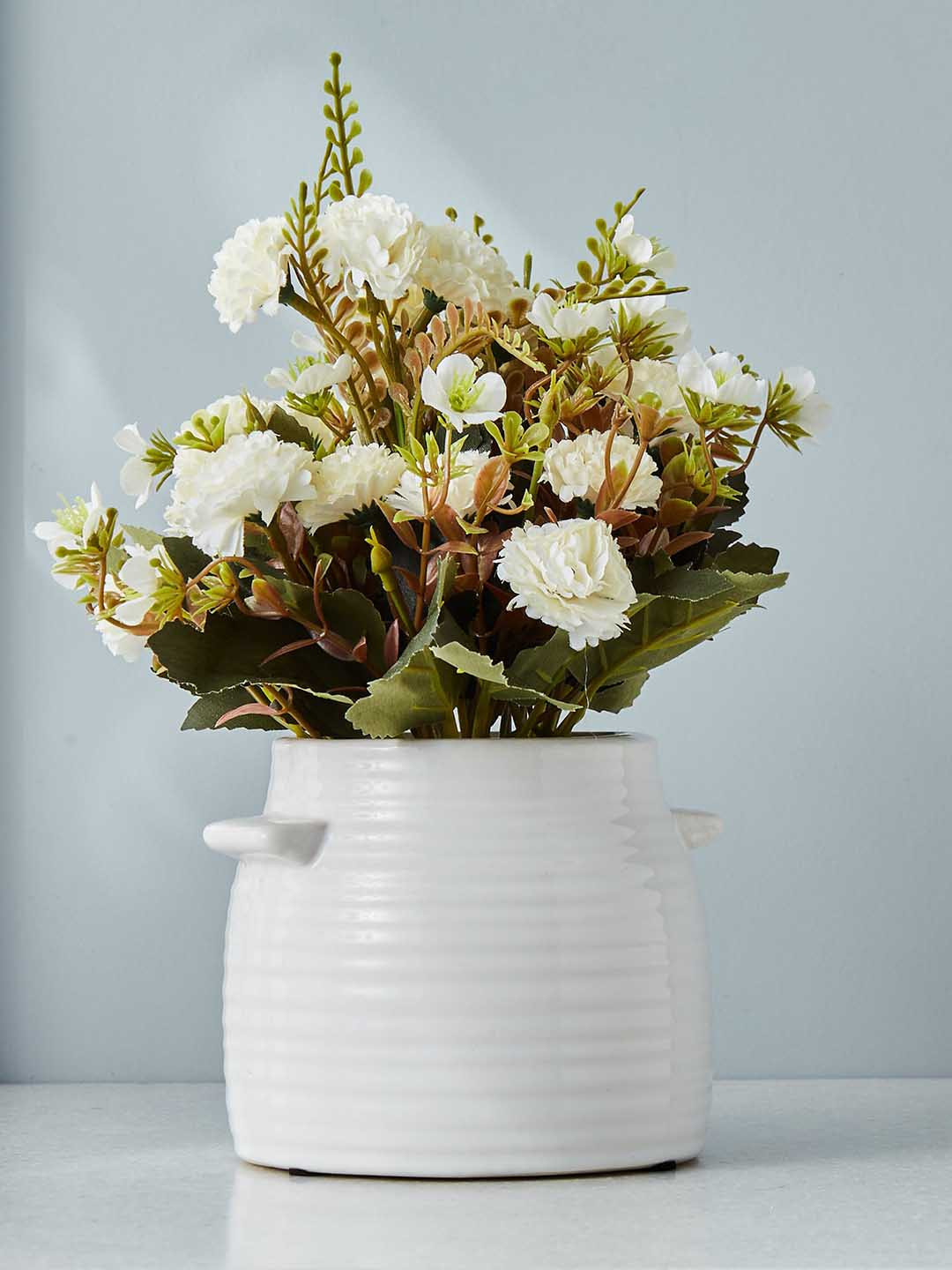 Home Centre White Artificial Gloria Flowers In Ceramic Pot