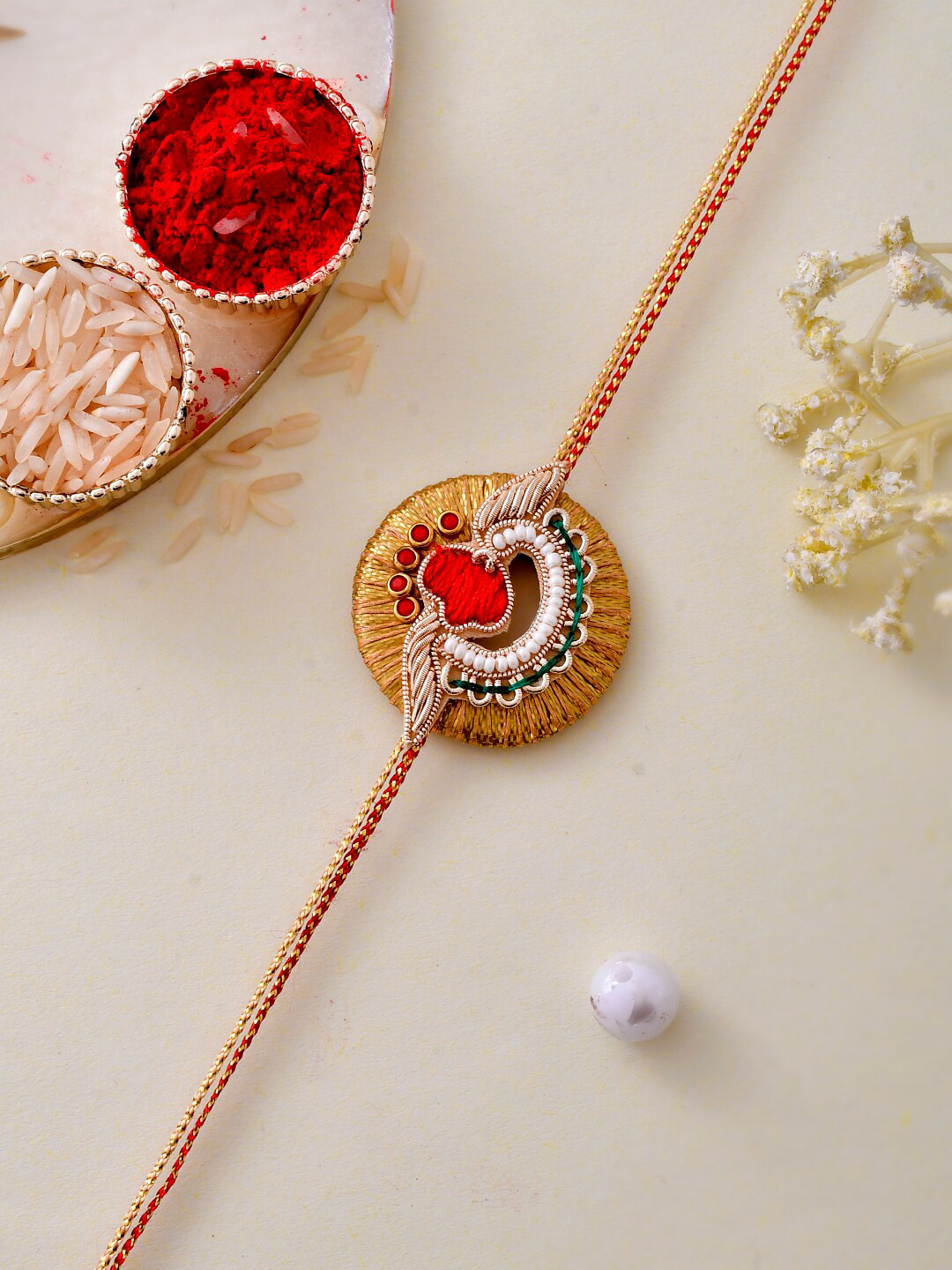Aapno Rajasthan Unisex Gold Plated Gota & Aari Crafted Traditional Rakhi