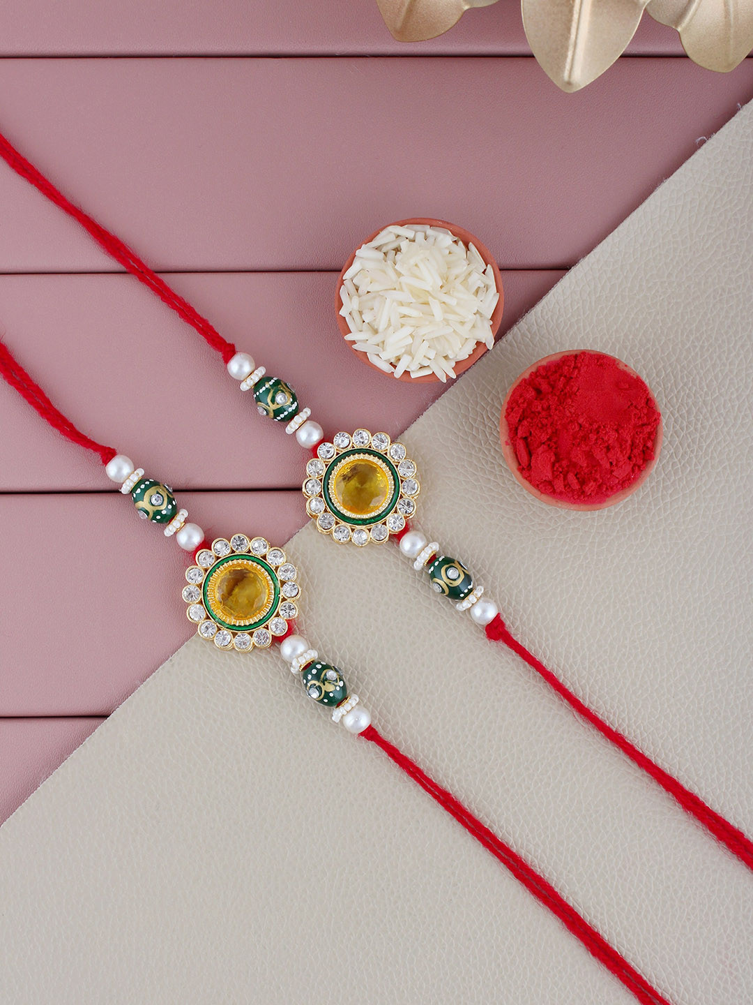 LUCKY JEWELLERY Set Of 2 Gold-Plated Stone-Studded Floral Rakhi with Roli, Rice & Card